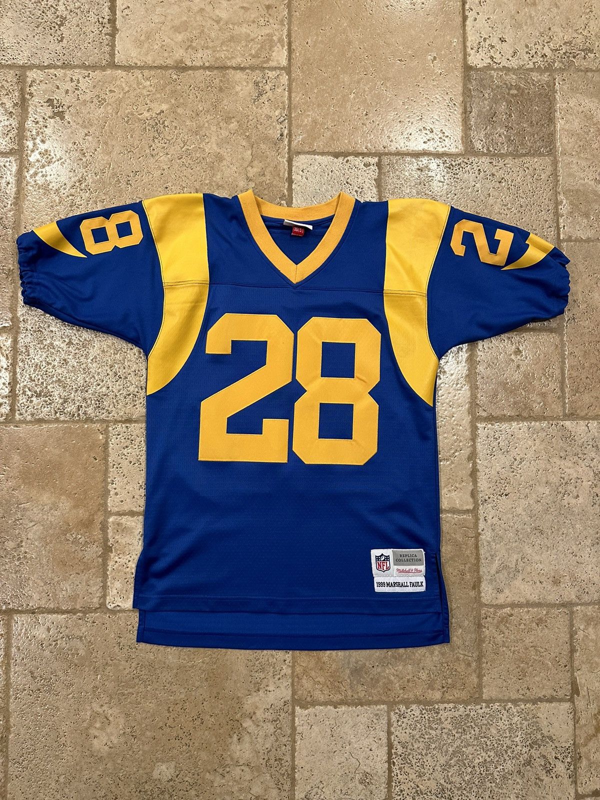 Image of Mitchell Ness x Nfl Mitchell & Ness Nfl 1999 Rams Blue Marshall Faulk Jersey, Men's (Size Small)