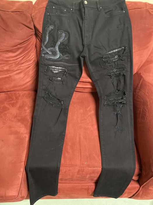 Amiri black hot sale snake jeans