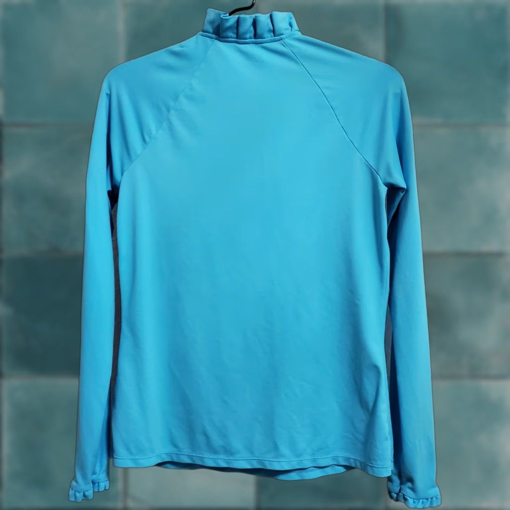 Lilly Pulitzer **Lilly Pulitzer Women's Blue Long Sleeve Ruffle Collar Polo Shirt** User: **Lilly Pulitzer Women's Blue Long Sleeve Ruffle Collar Polo Shirt** Size S / US 4 / IT 40 - 1 Thumbnail