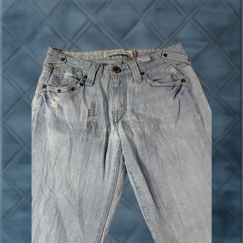 Levi's VINTAGE Levi's 518 Jeans Women's SuperLow Bootcut Size 5M Distressed Stained Y2K Blue denim 30in inseam Mens logo solid 5-Pocket Size 27" / US 4 / IT 40 - 1 Thumbnail