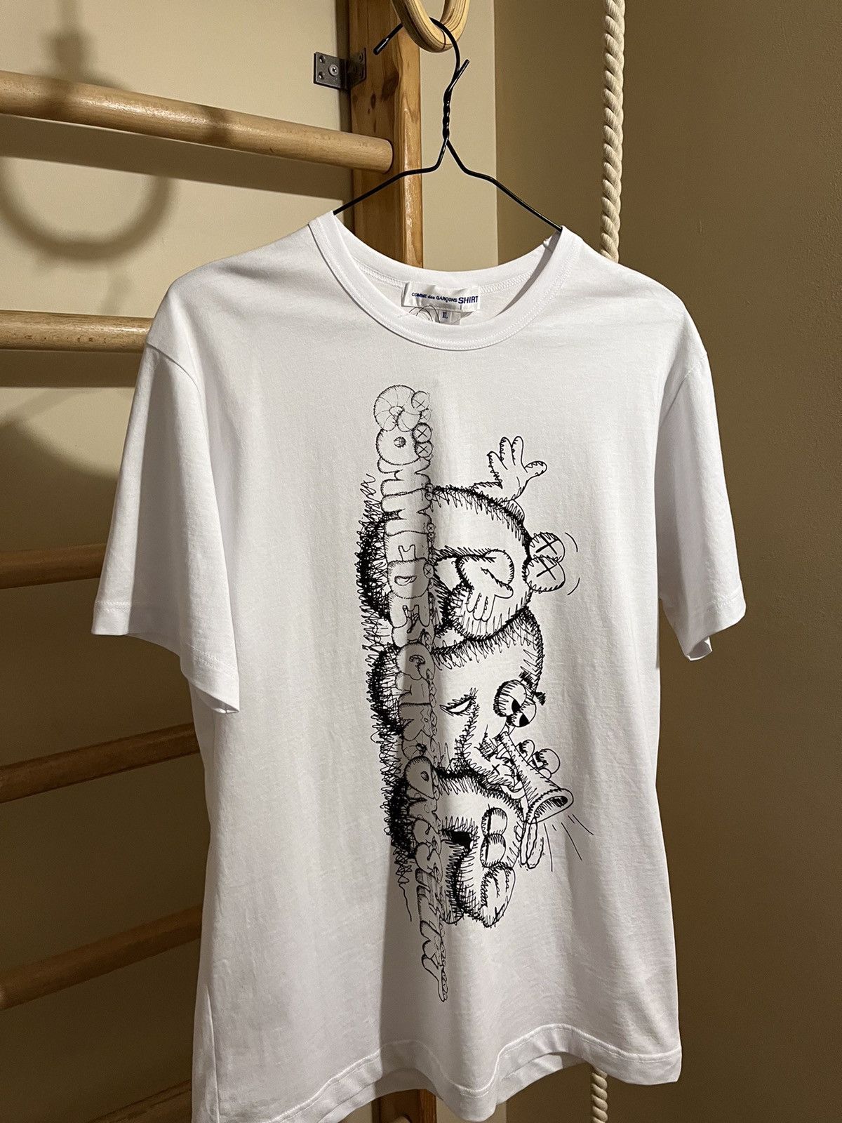 Comme des garcons uniqlo white sale