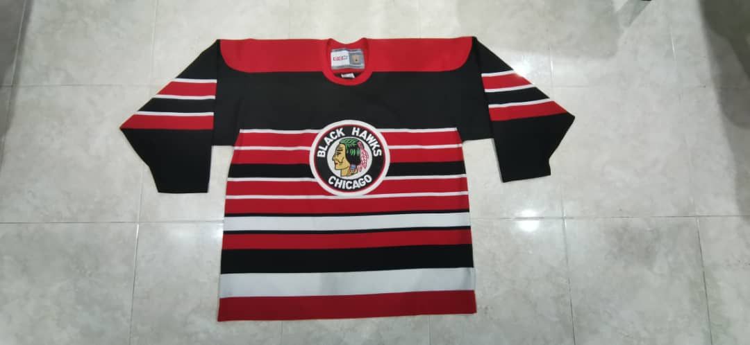 image of Ccm Chicago Blackhawks Nhl Hockey Jersey in Black Red White, Men's (Size XL)