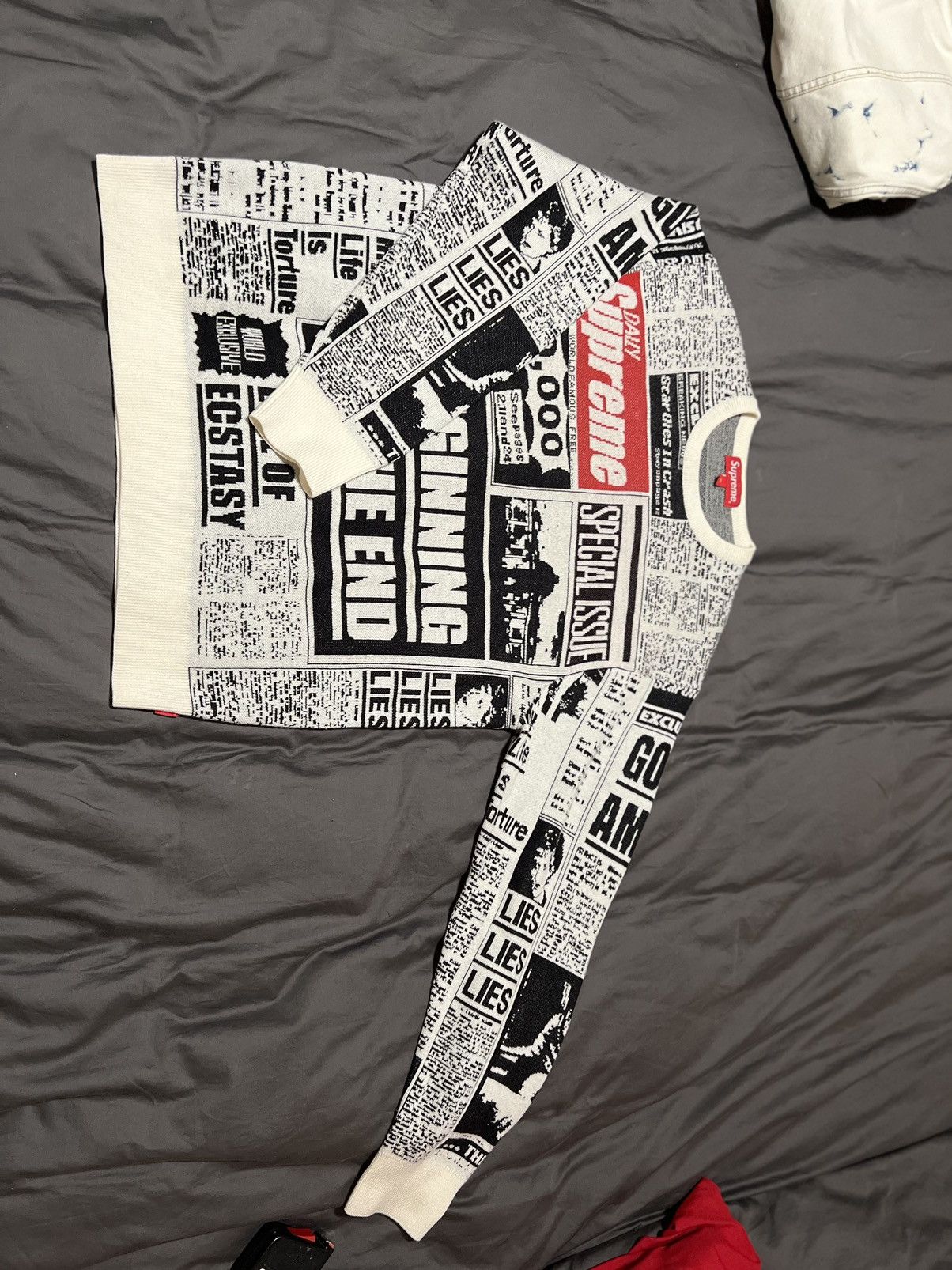 Supreme Supreme newsprint sweater | Grailed