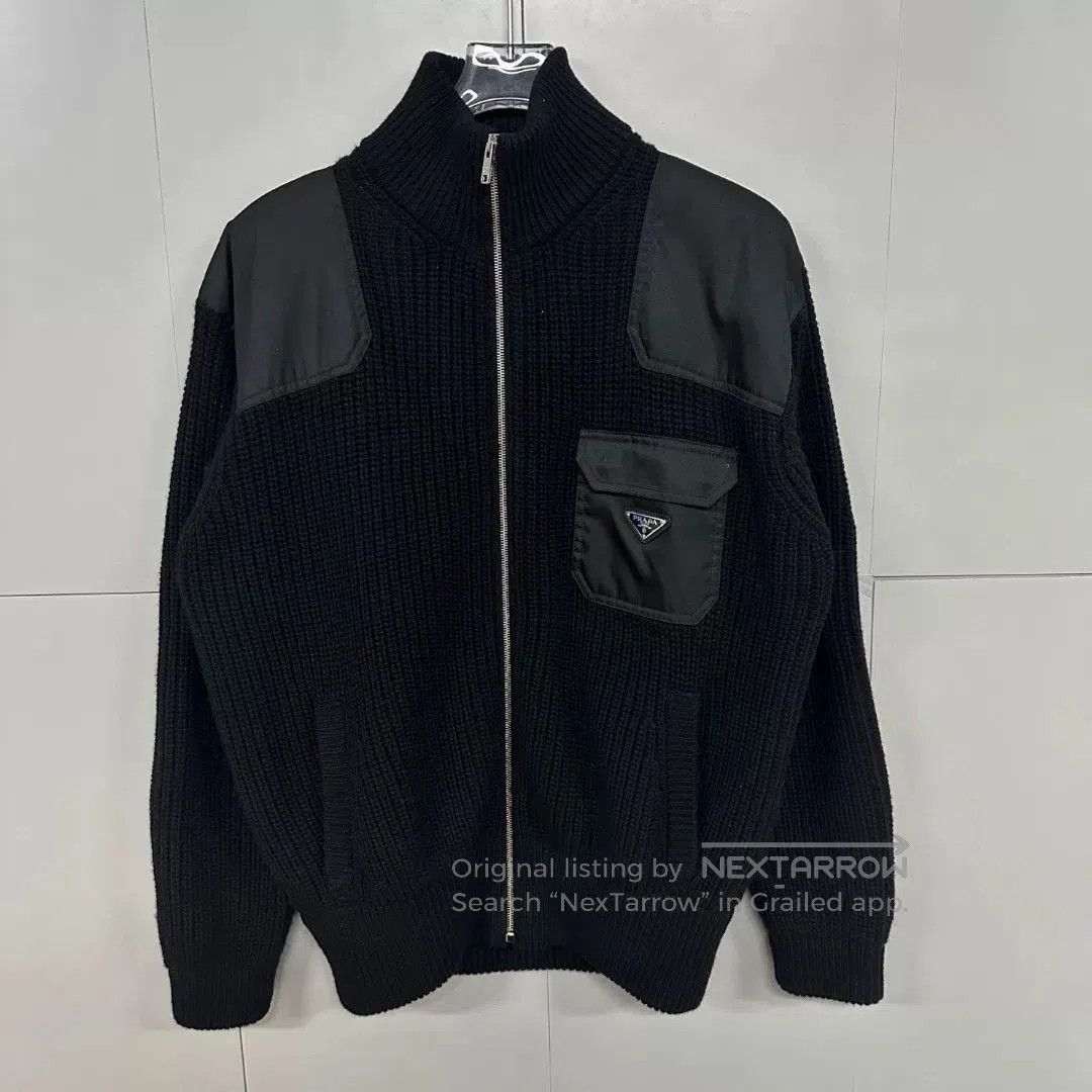 prada black knit jacket with triangle logo.