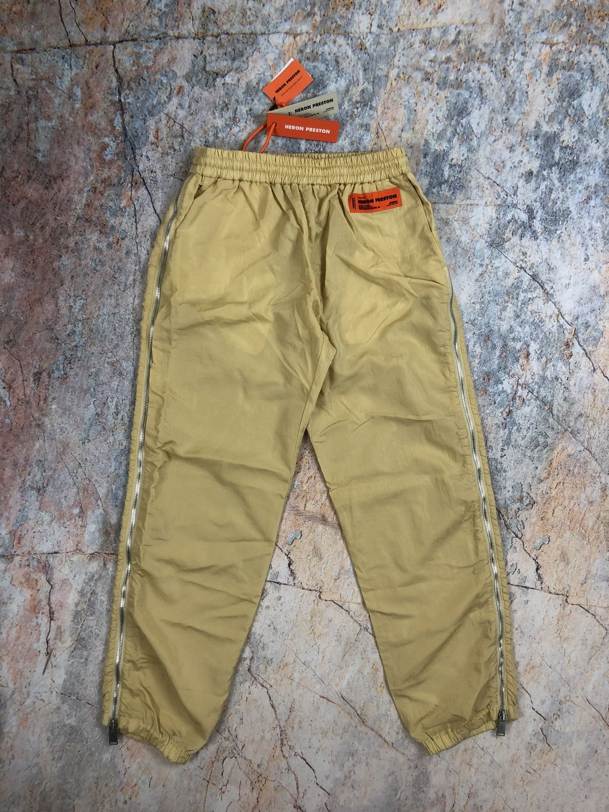 image of Heron Preston New Nylon Zip Pants in Cream, Men's (Size 33)