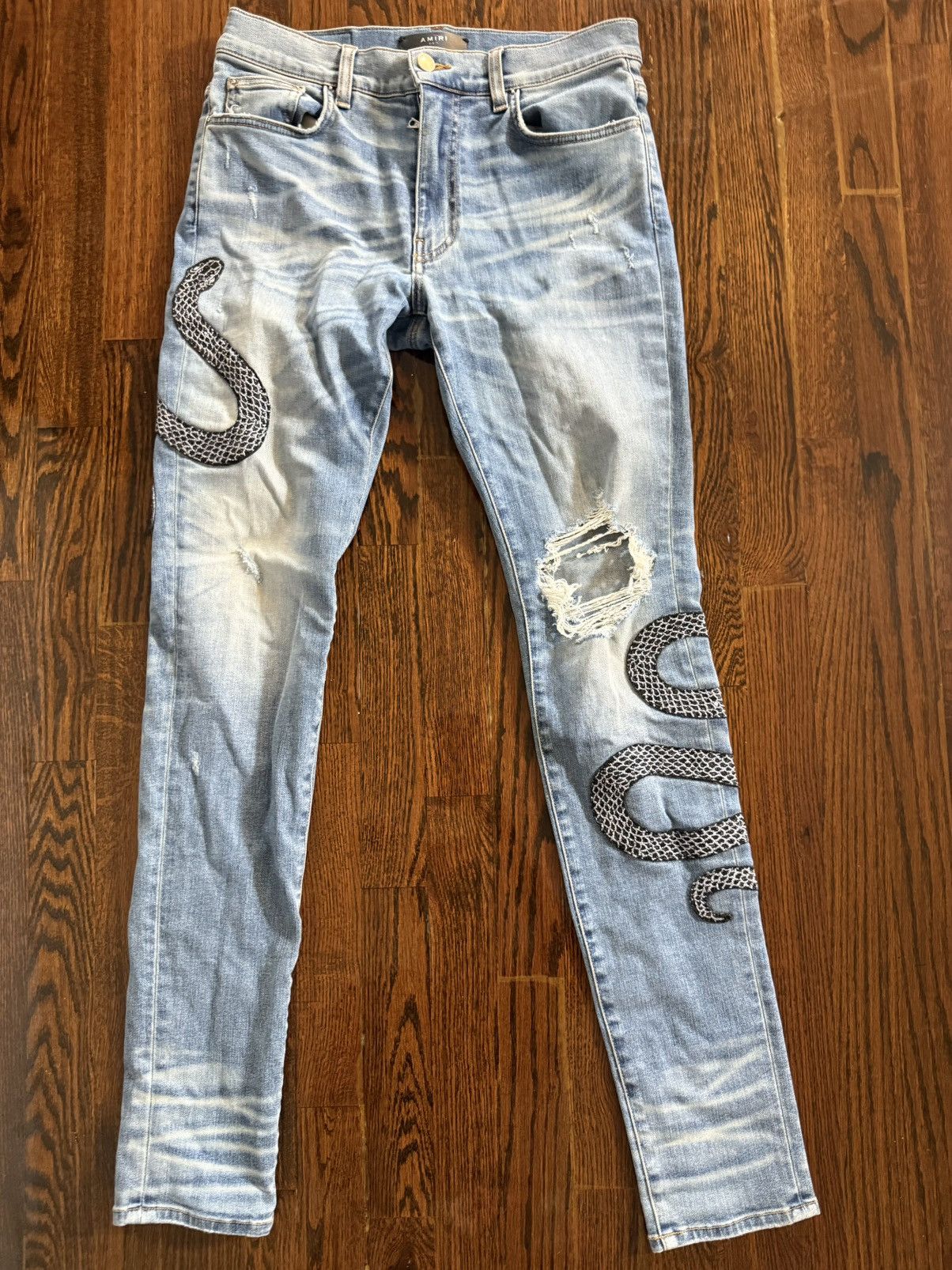 Blue Amiri snake jeans