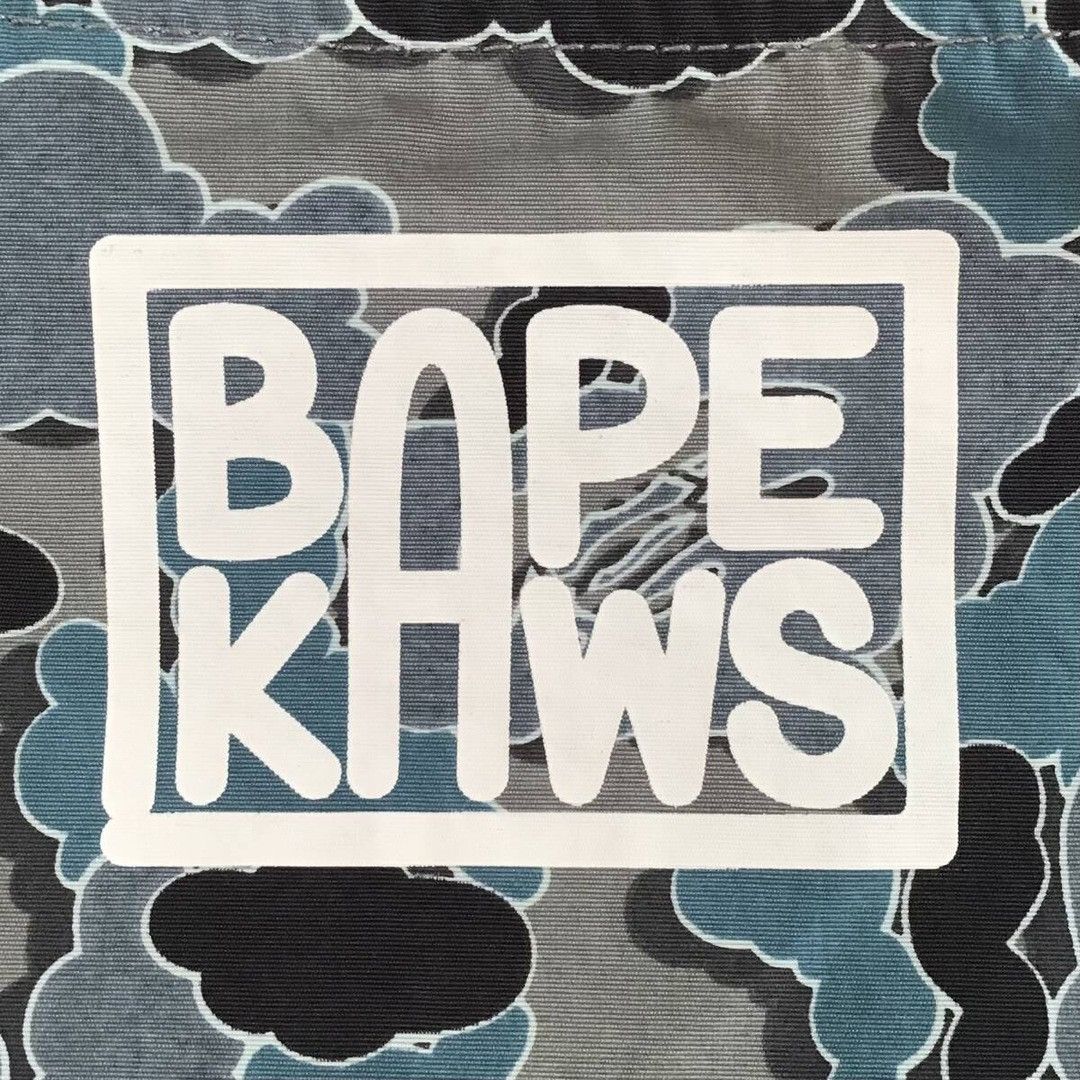 Bape × Kaws BAPE × KAWS cloud camo coach jacket a bathing ape NIGO Size US L / EU 52-54 / 3 - 4 Thumbnail