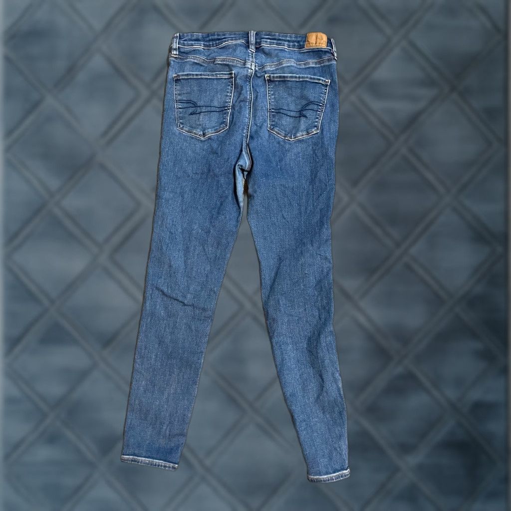 American Eagle Outfitters VINTAGE American Eagle Blue Super Stretch Hi-Rise Jegging Pants 12 Reg MedWash Distresse Females/Women (if applicable) Size 34" / US 12 / IT 48 - 1 Thumbnail