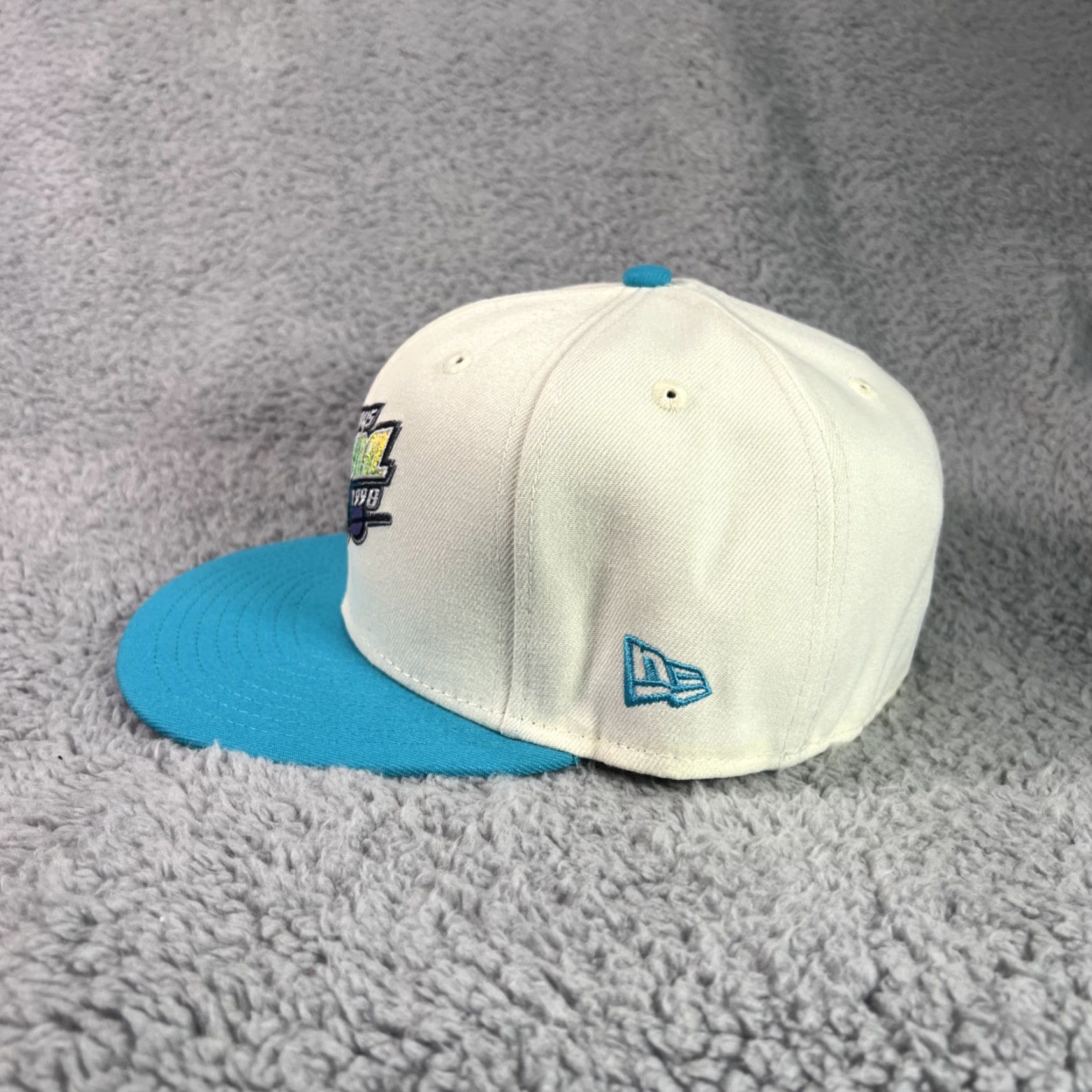 New Era FRESH RAGS New Era Tampa Bay Devil Rays Tropicana Patch 7 5/8 GLOW 1998 SOLD OU Shirt Unisex Adults White Glow 1998 Mens Womens Boys Girls Size ONE SIZE - 4 Thumbnail