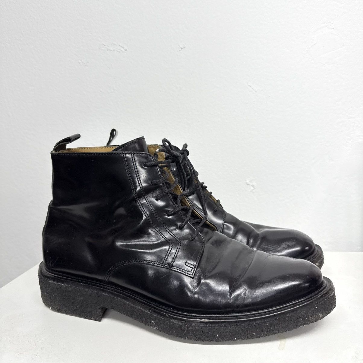 Ami Alexandre Mattiussi combat boots laced up splatter
