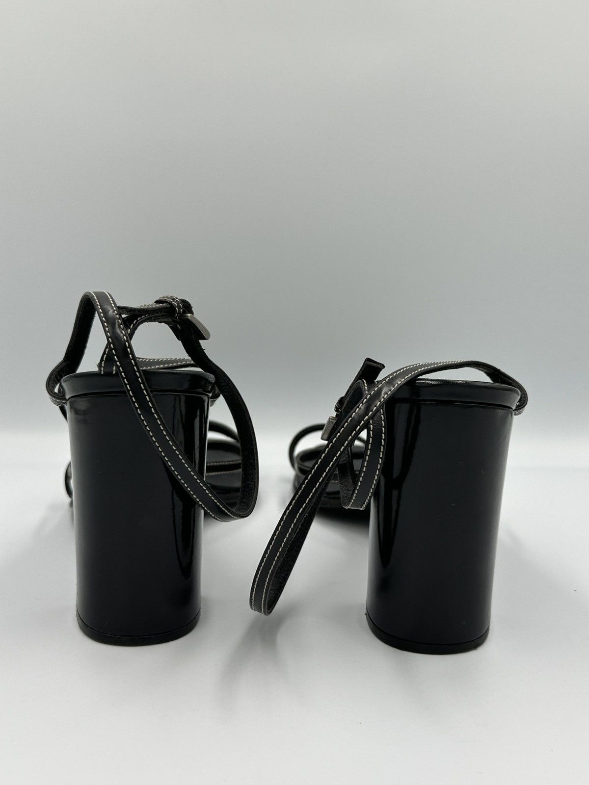 Prada heeled sandals crafted from black leather