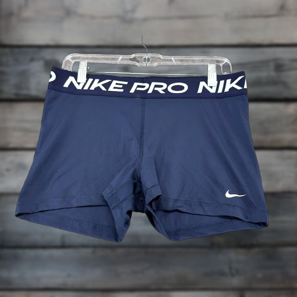 Nike VINTAGE? Wait—no. The item is not marked vintage. So: Nike Shorts Womens L Blue Navy Pro Spellout Compression Solid Logo Dri Fit Logo Size 36" / US 14 / IT 50 - 1 Thumbnail