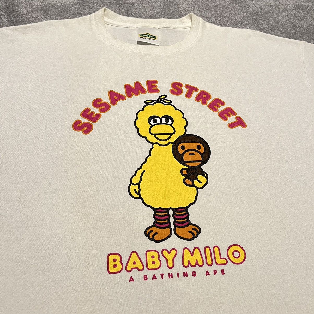 image of A Bathing Ape Bape Sesame Street Big Bird Baby Milo T Shirt in White/Yellow, Men's (Size 2XL)