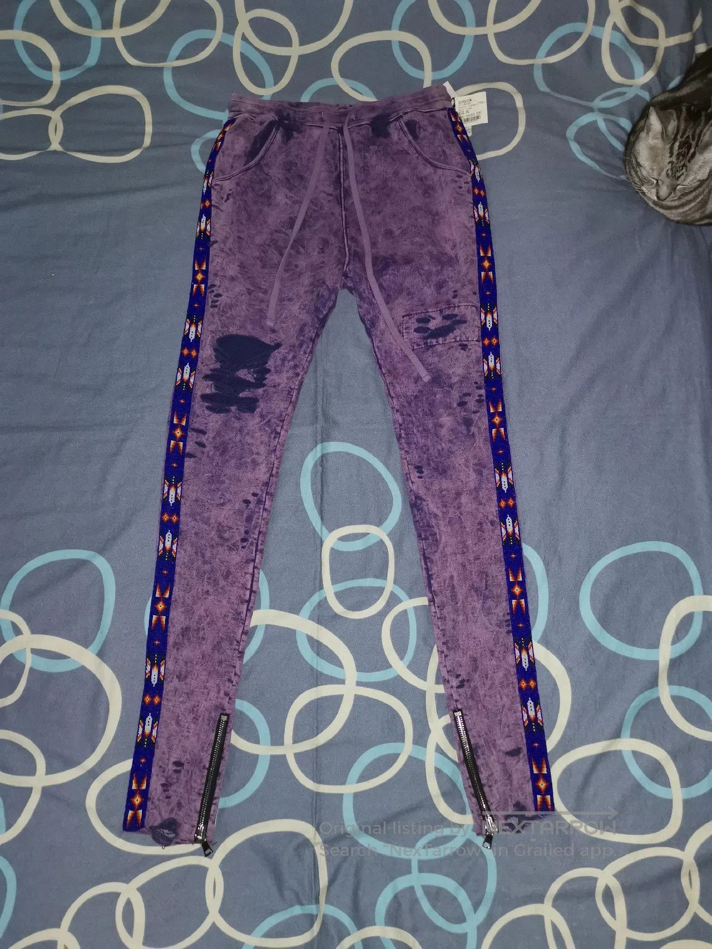 alchemist tie-dye embroidered sweatpants.