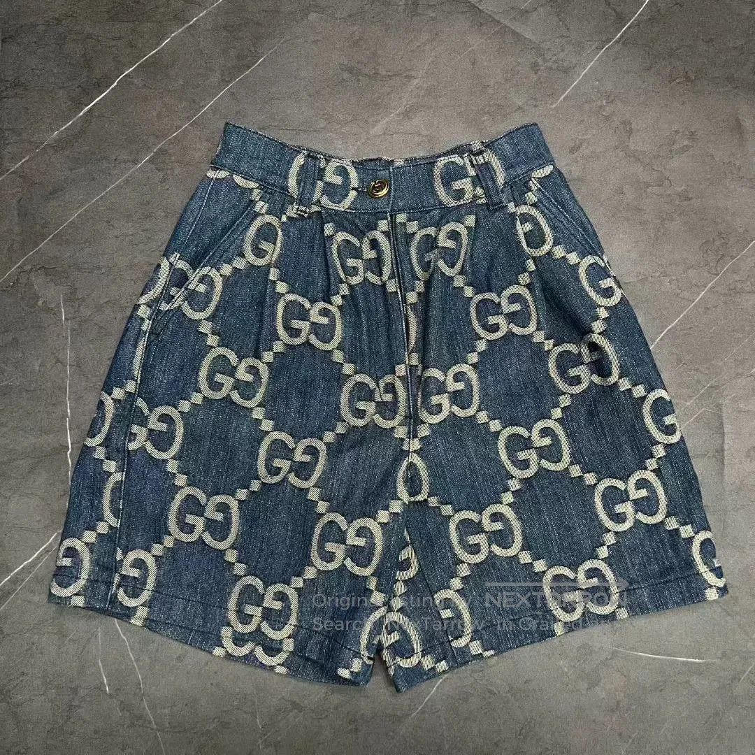 Gucci gucci denim logo printed shorts size 34. Size 33" - 1 Thumbnail