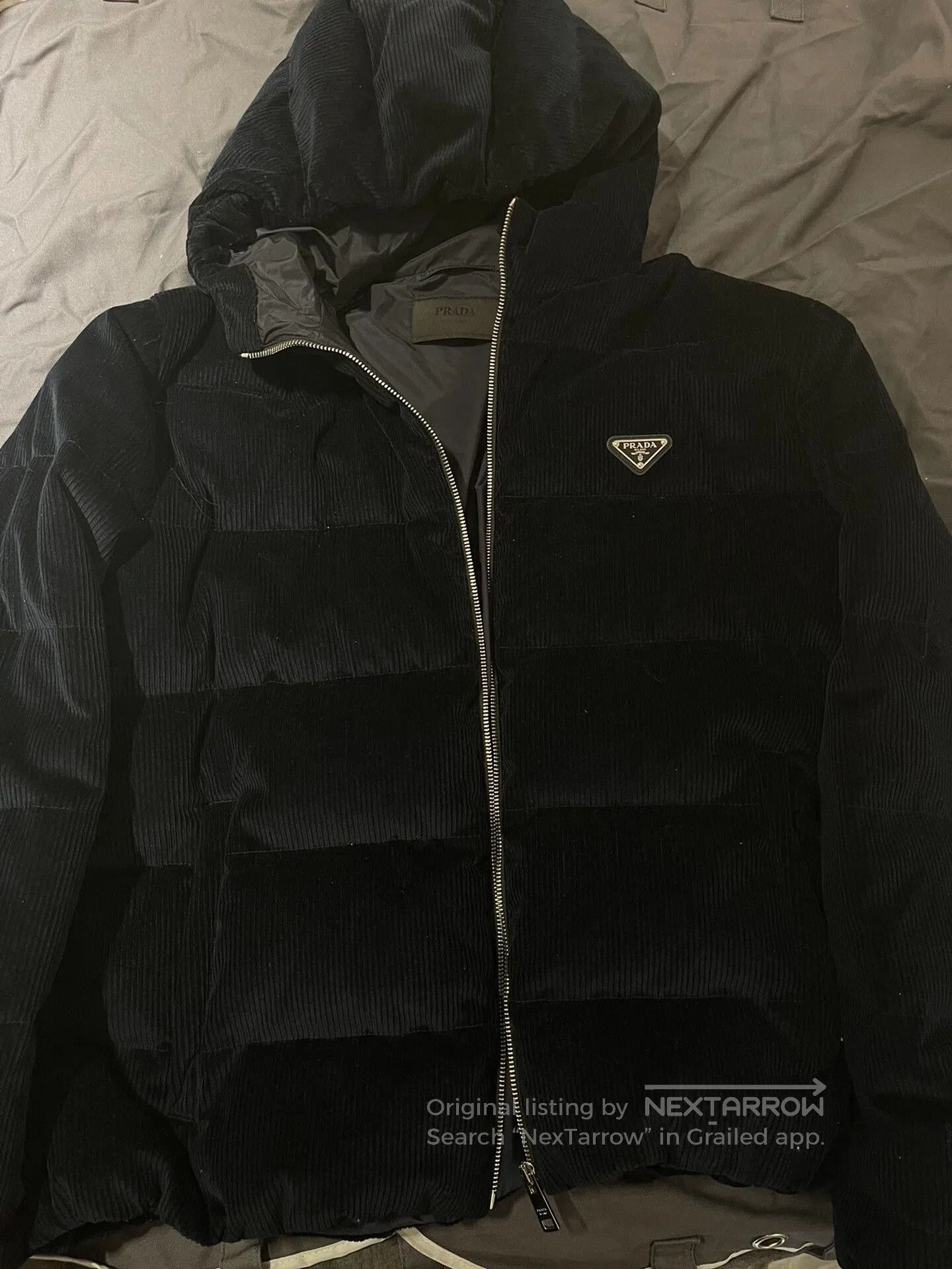 prada corduroy down jacket in navy blue.