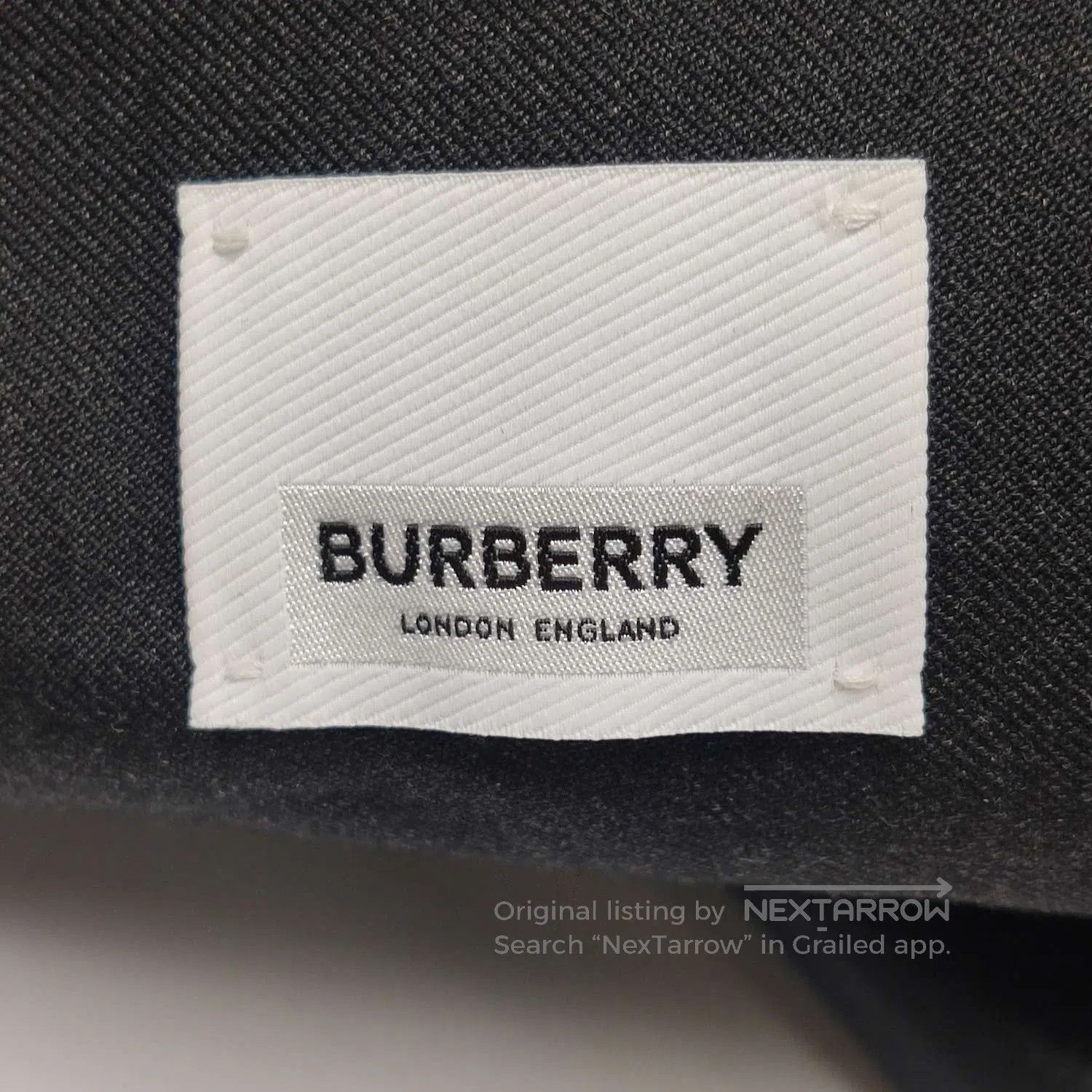 Burberry Black Hooded Buttoned Jacket.