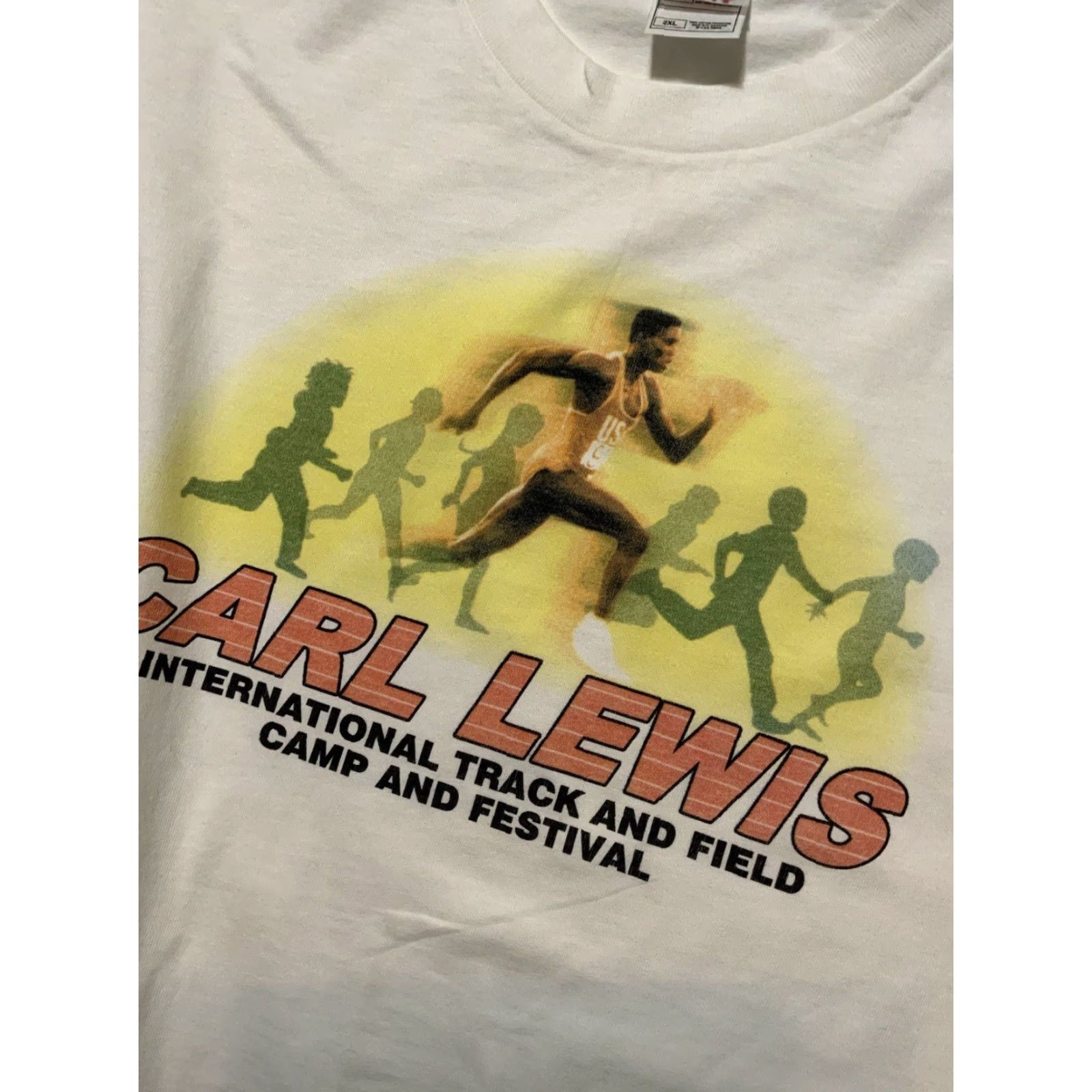 Fruit Of The Loom VINTAGE Carl Lewis International Track & Field Camp Festival Graphic T-Shirt 2XL Mens White Fruit of the Loom shirts? Size US XXL / EU 58 / 5 - 6 Thumbnail