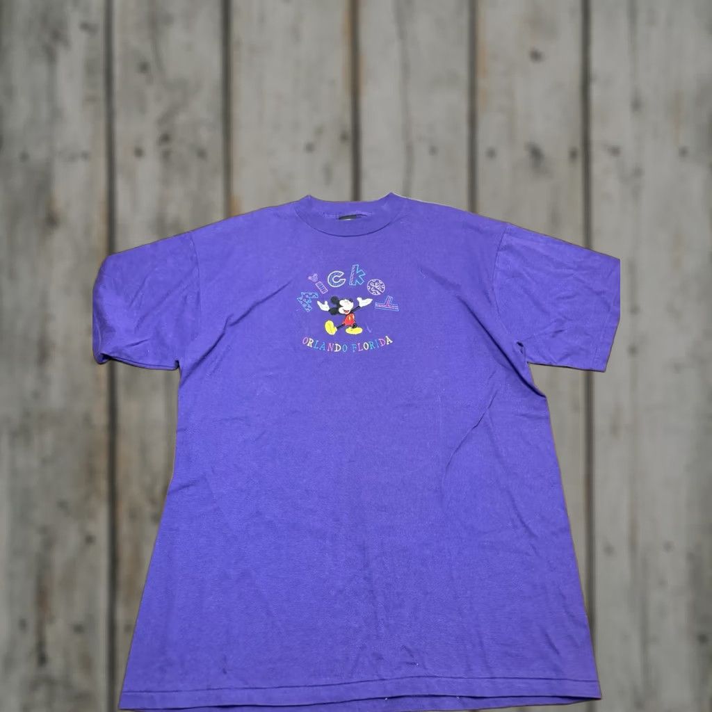 Mickey Unlimited VINTAGE Mickey Unlimited Disney World Florida Purple T-Shirt XL Men Mickey Mouse Short Sleeve Crew Neck Embroidered Logo 90s Theme Park Cartoons Size US XL / EU 56 / 4 - 1 Thumbnail