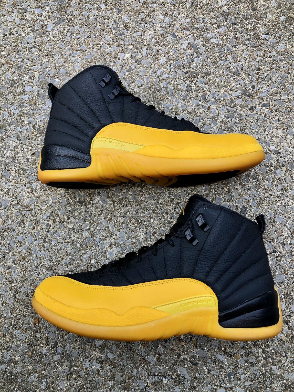 image of Jordan Brand 12 Black University Gold Shoes, Men's (Size 10)