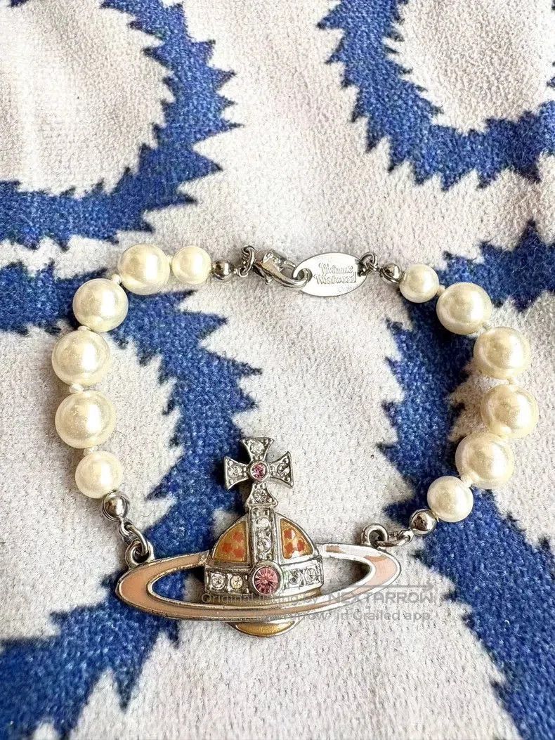 Vivienne Westwood Vivienne Westwood Pink Pearl Saturn Bracelet. Size ONE SIZE - 1 Thumbnail