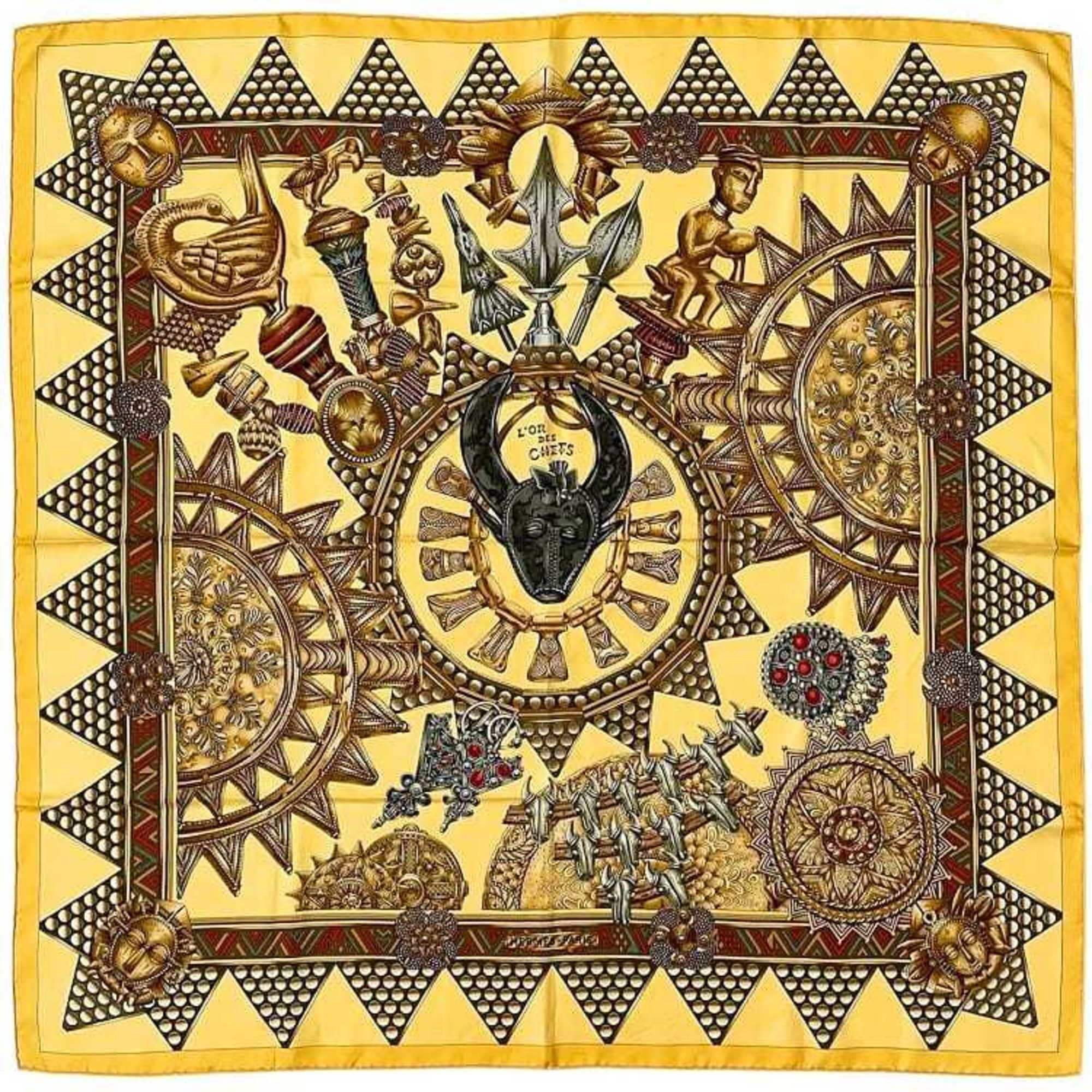 Hermes Hermes Hermès Carré 90 Scarf (ec-23771) in Beige and Brown. Made of 100% Silk, "L'OR DES CHEFS" (The Chiefs' Gold). A large, ethnic scarf from the collection. Size ONE SIZE - 1 Thumbnail