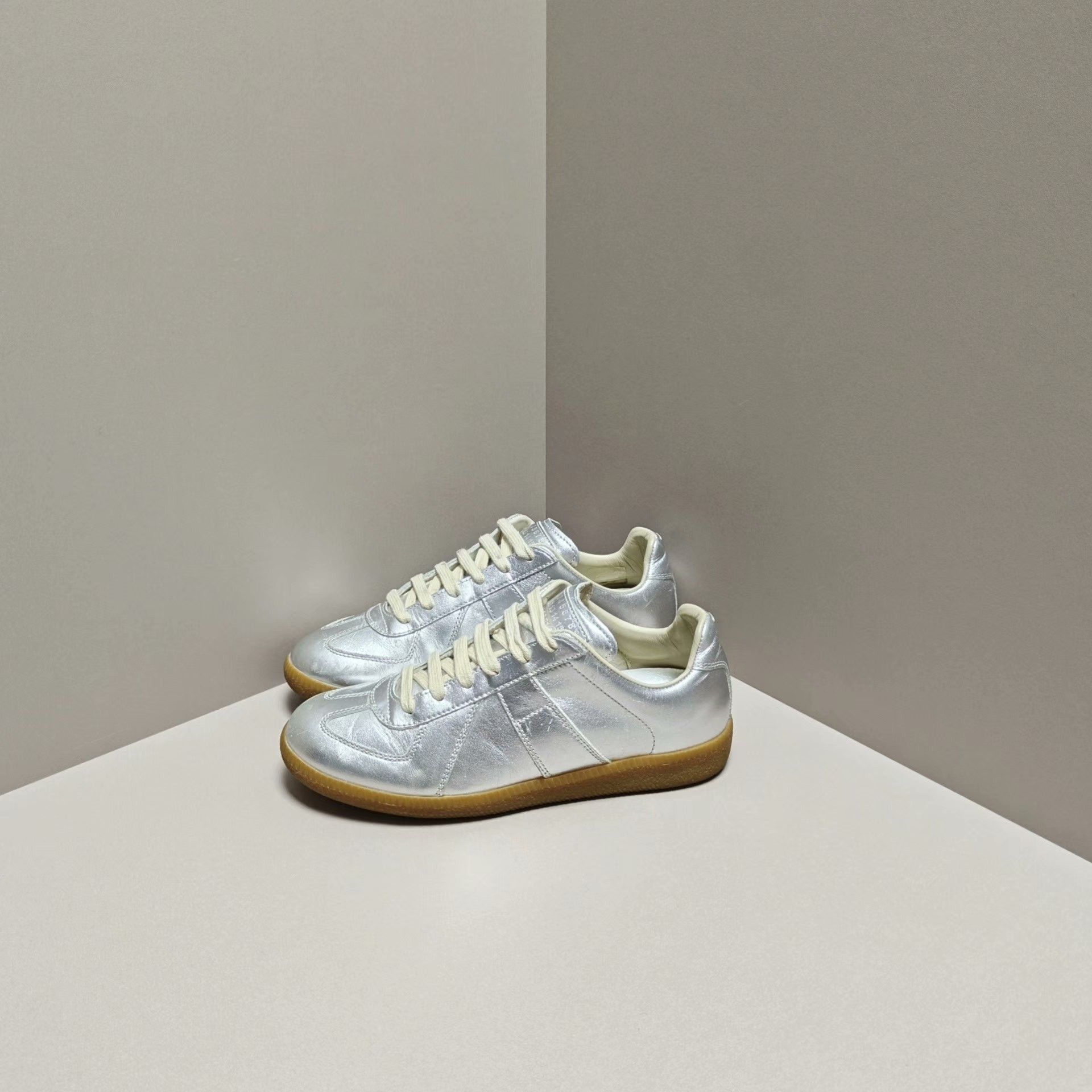 Maison Margiela Maison Margiela Silver Lowtop Sneakers us_6 Women Size US 6 / IT 36 - 1 Thumbnail