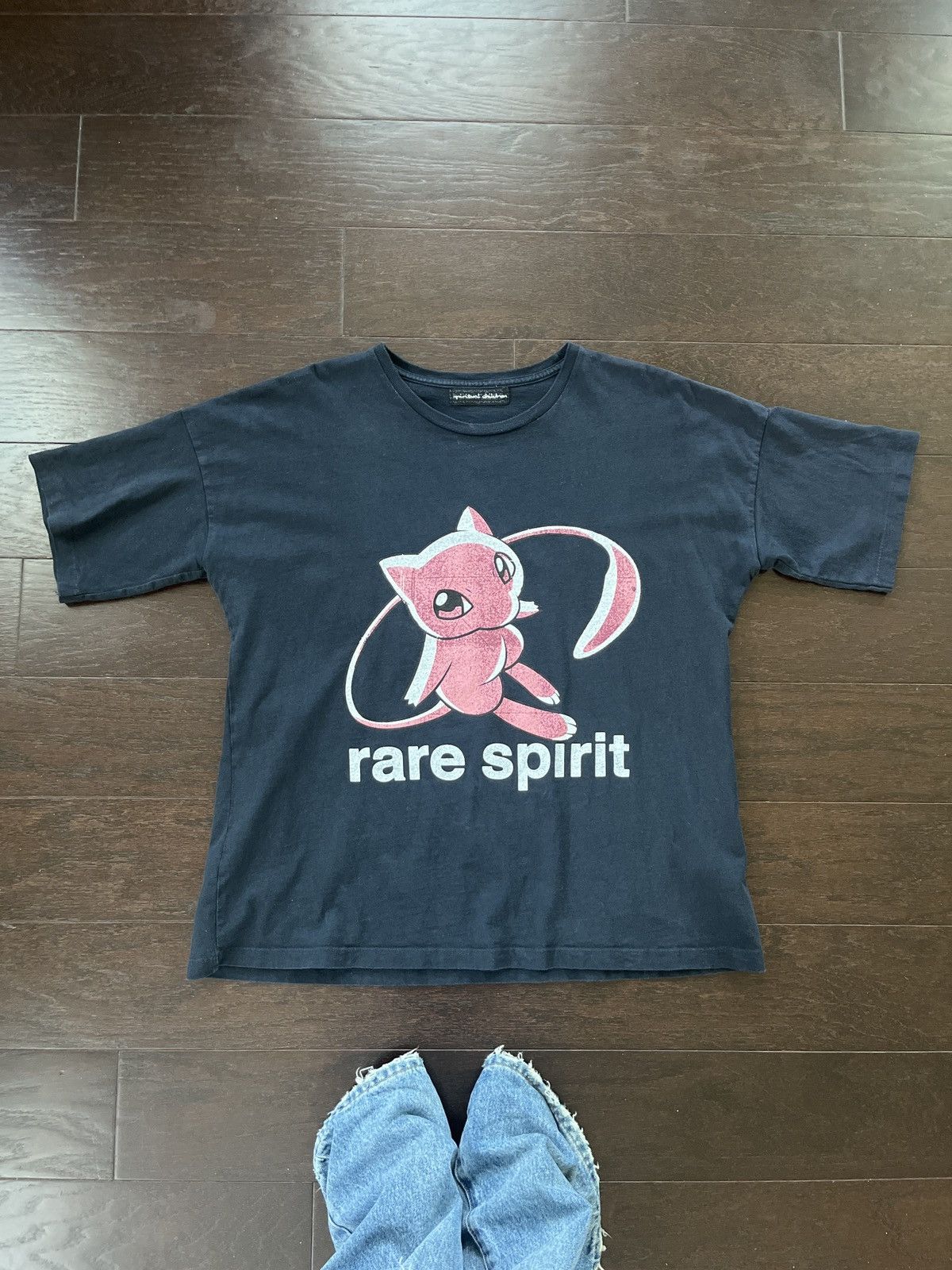 image of Spirit Spiritual Children Siberia Hills Pokémon Mew Tee in Black, Men's (Size Small)