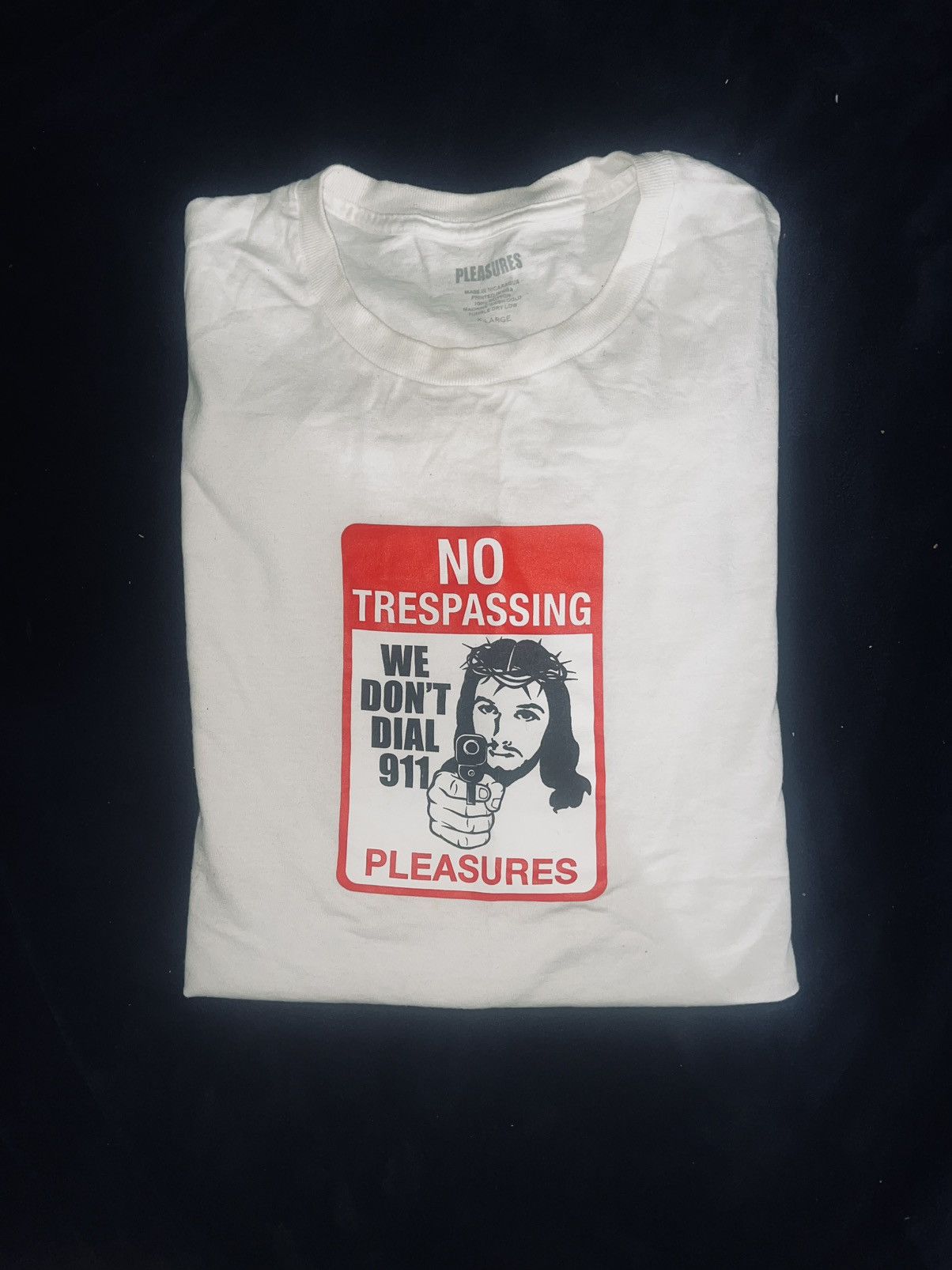 Pleasures Graphic Tee “We Don’t Dial 911”
