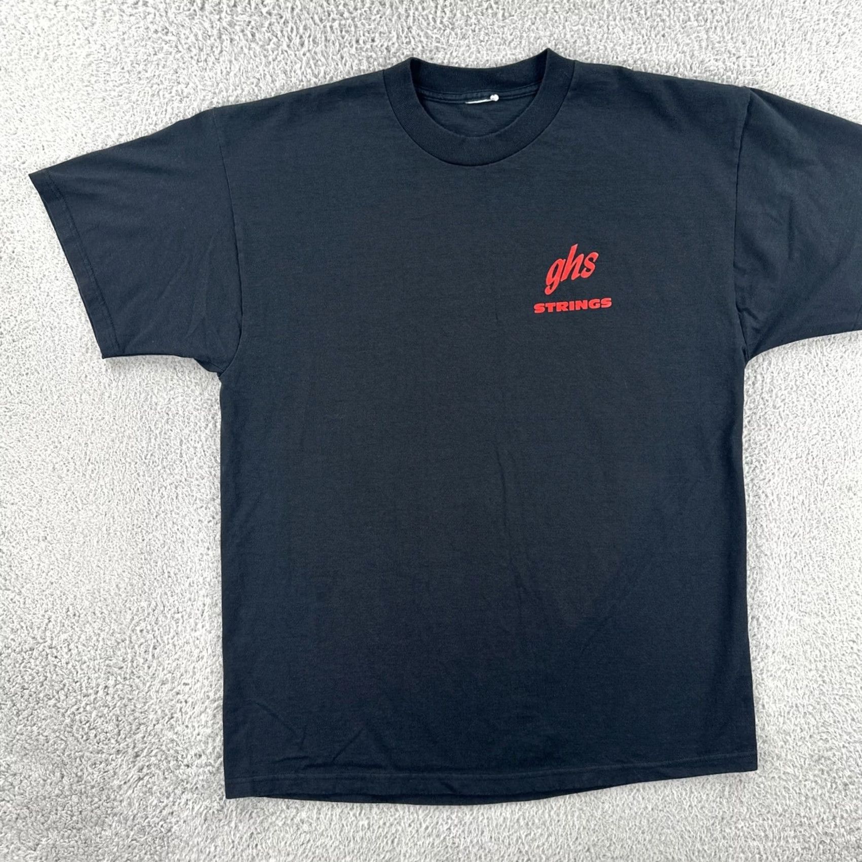 Vintage VINTAGE GHS STRINGS Boomers Guitar And Bass Strings Mens Large Black T Shirt 90s Size US L / EU 52-54 / 3 - 4 Thumbnail