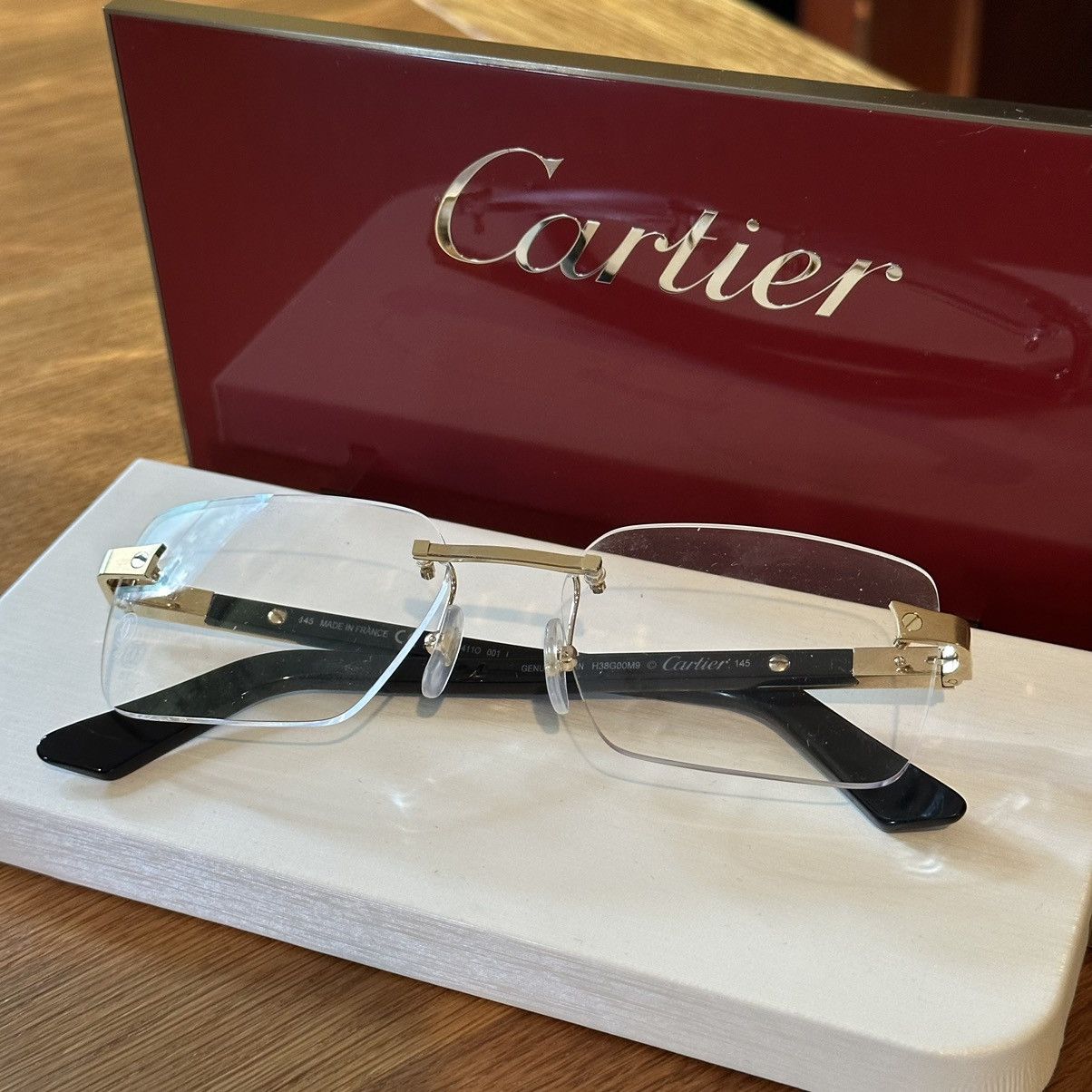 Cartier CT0411O Black Buff FW23 Rimless Glasses | Grailed