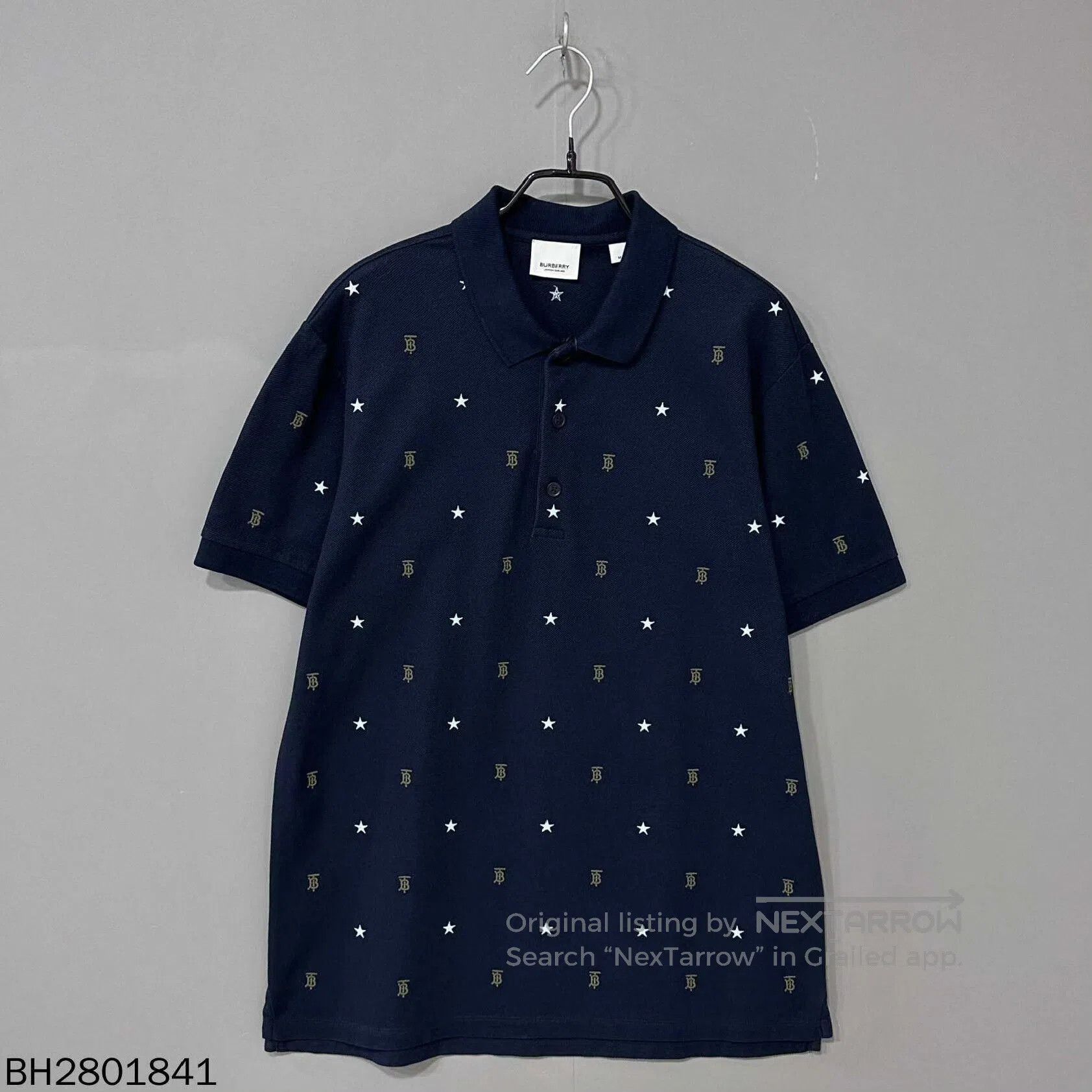 Burberry navy embroidered logo polo shirt by Burberry. Size US M / EU 48-50 / 2 - 1 Thumbnail