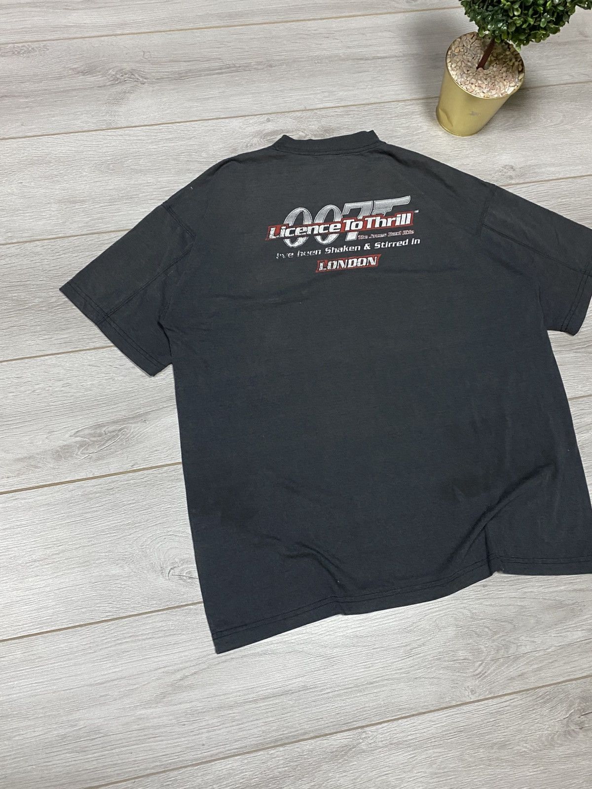 Vintage Vintage 1997 James Bond 007 faded Tomorrow Never Dies Tee Size US XL / EU 56 / 4 - 10 Thumbnail