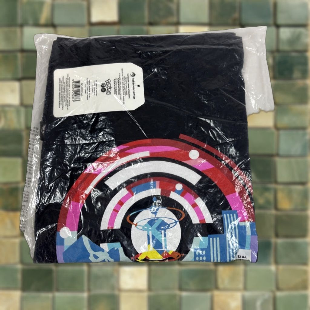 Vintage Pokemon GO Fest 2021 Pokemon Center Exclusive Limited Edition T Shirt Large NWT Unisex Adults Blue Short Sleeve Crew Neck Shirt Size US L / EU 52-54 / 3 - 1 Thumbnail