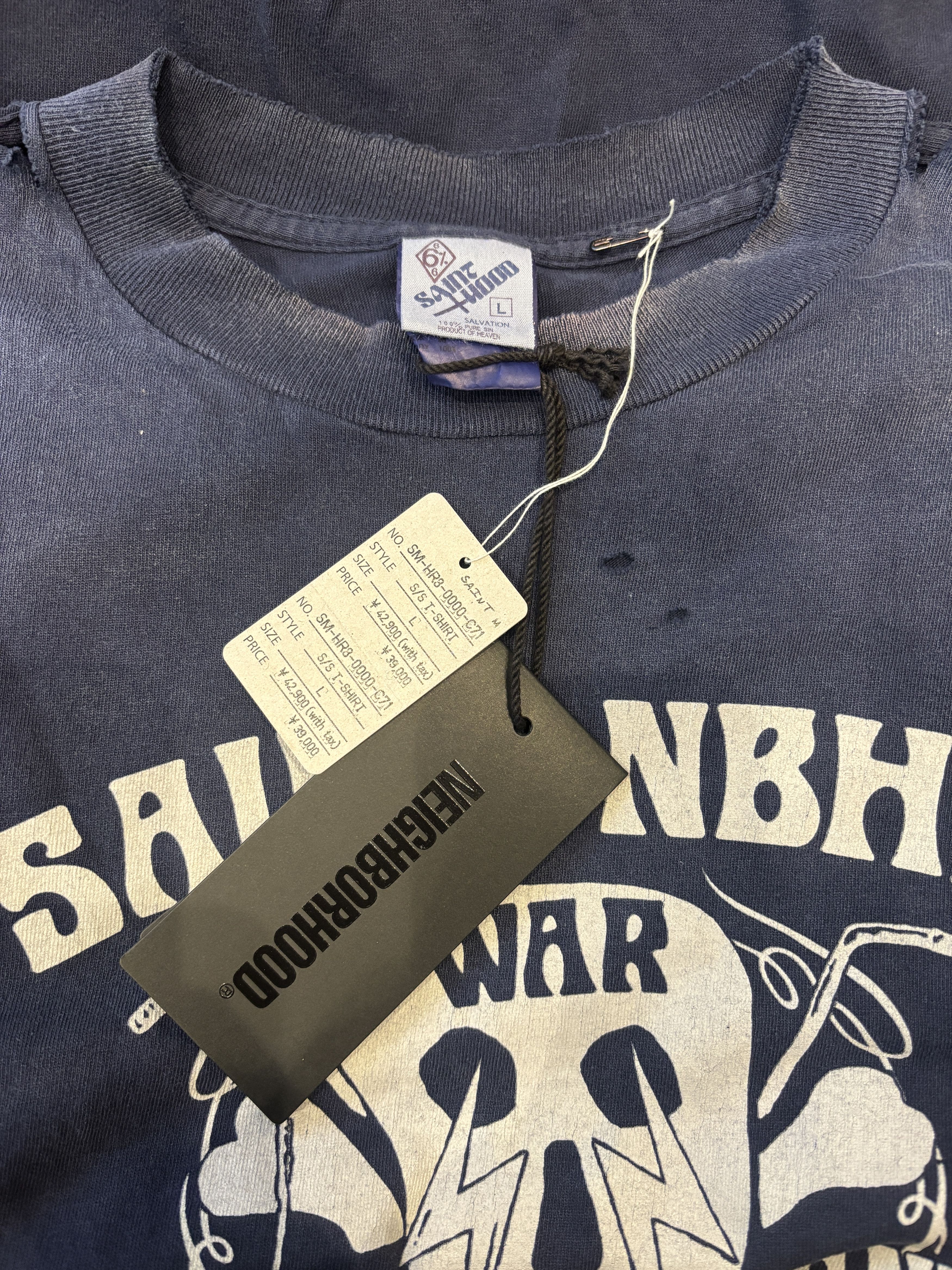 Neighborhood × Saint Michael Saint Michael x Neighborhood Saint NBHD Savages Tee Size US L / EU 52-54 / 3 - 6 Thumbnail