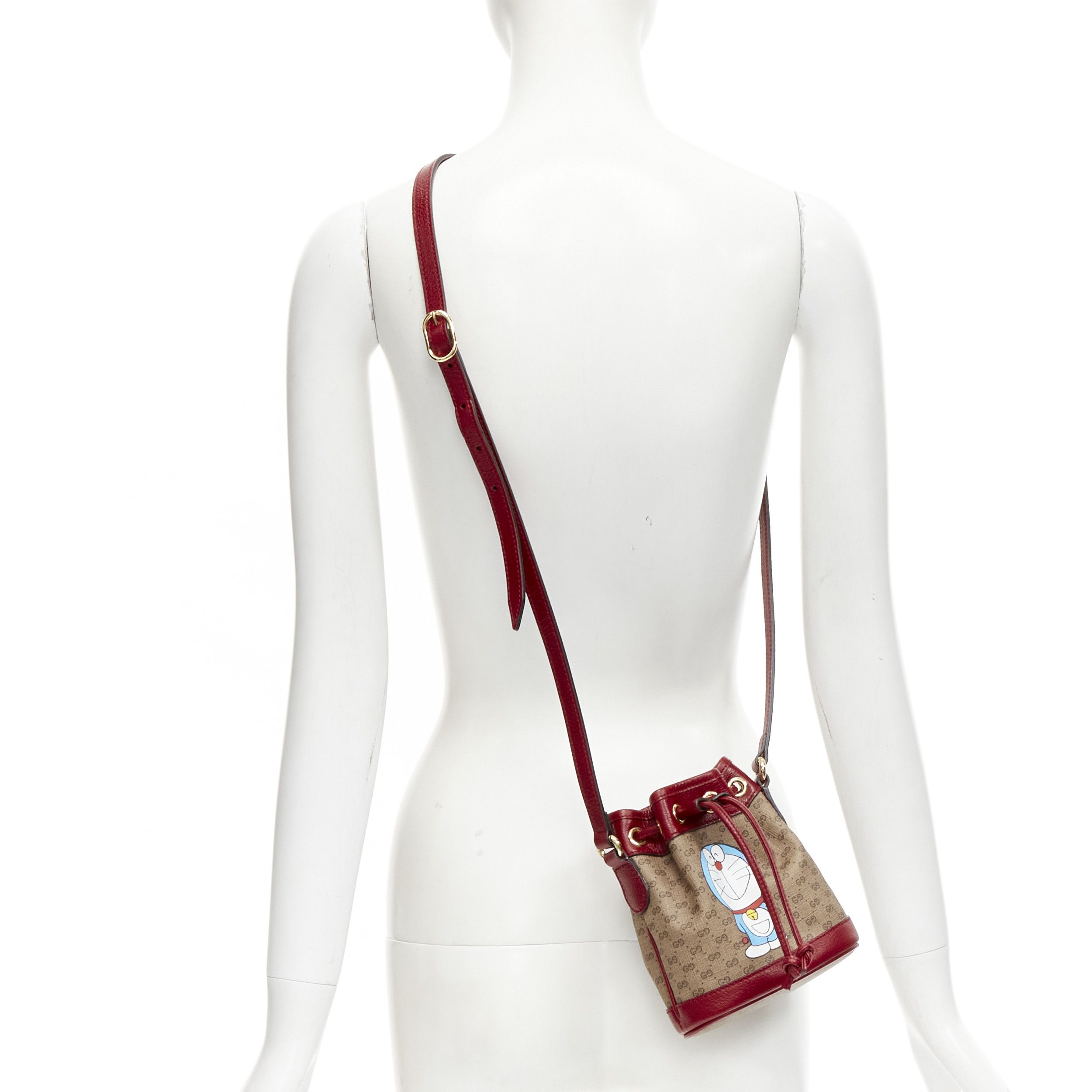 Gucci GUCCI DORAEMON 2021 Limited GG Supreme red drawstring crossbody bucket bag Size ONE SIZE - 1 Thumbnail