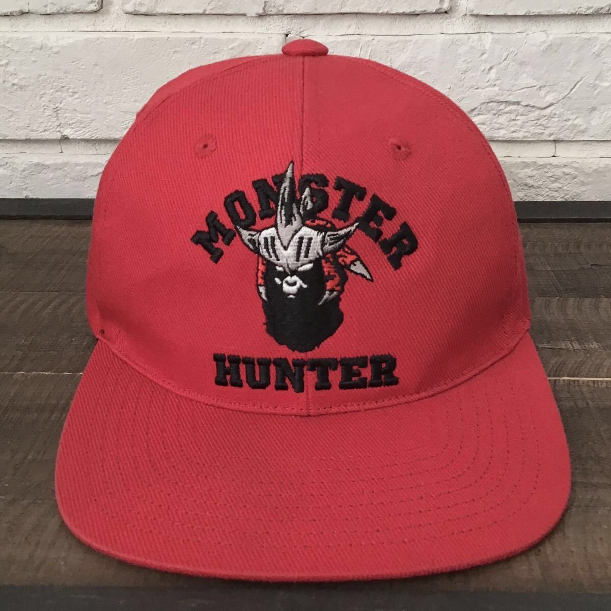 image of Bape × Capcom Monster Hunter Ape Head Snapback Cap Hat in Red, Men's