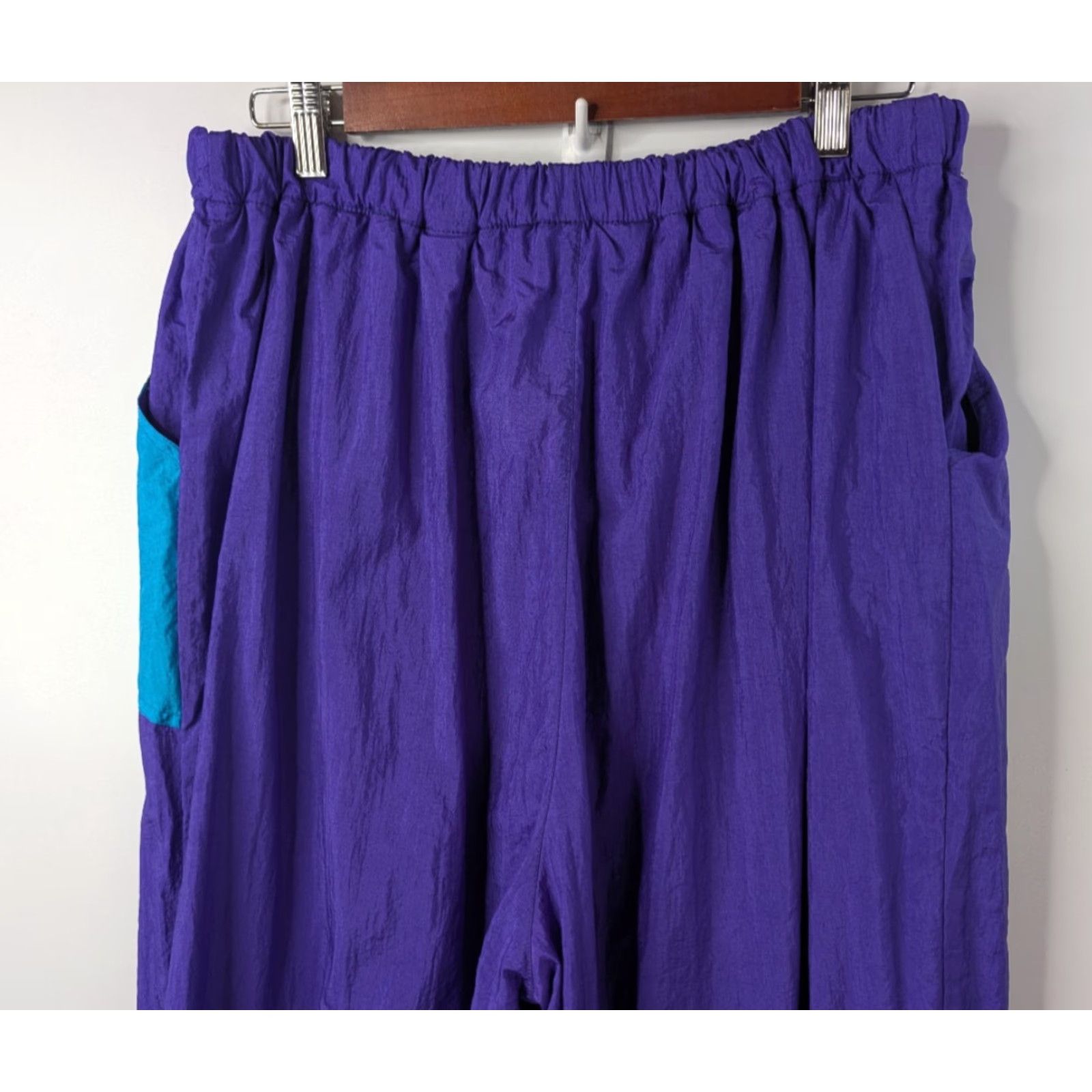 Vintage VINTAGE East West Purple Nylon Track Pants 18/20 Women Nylon Windbreaker Set Pocket Elastic Waist Wrinkle Resistant Retro 90s Athleisure Size 40" / US 18 - 6 Thumbnail