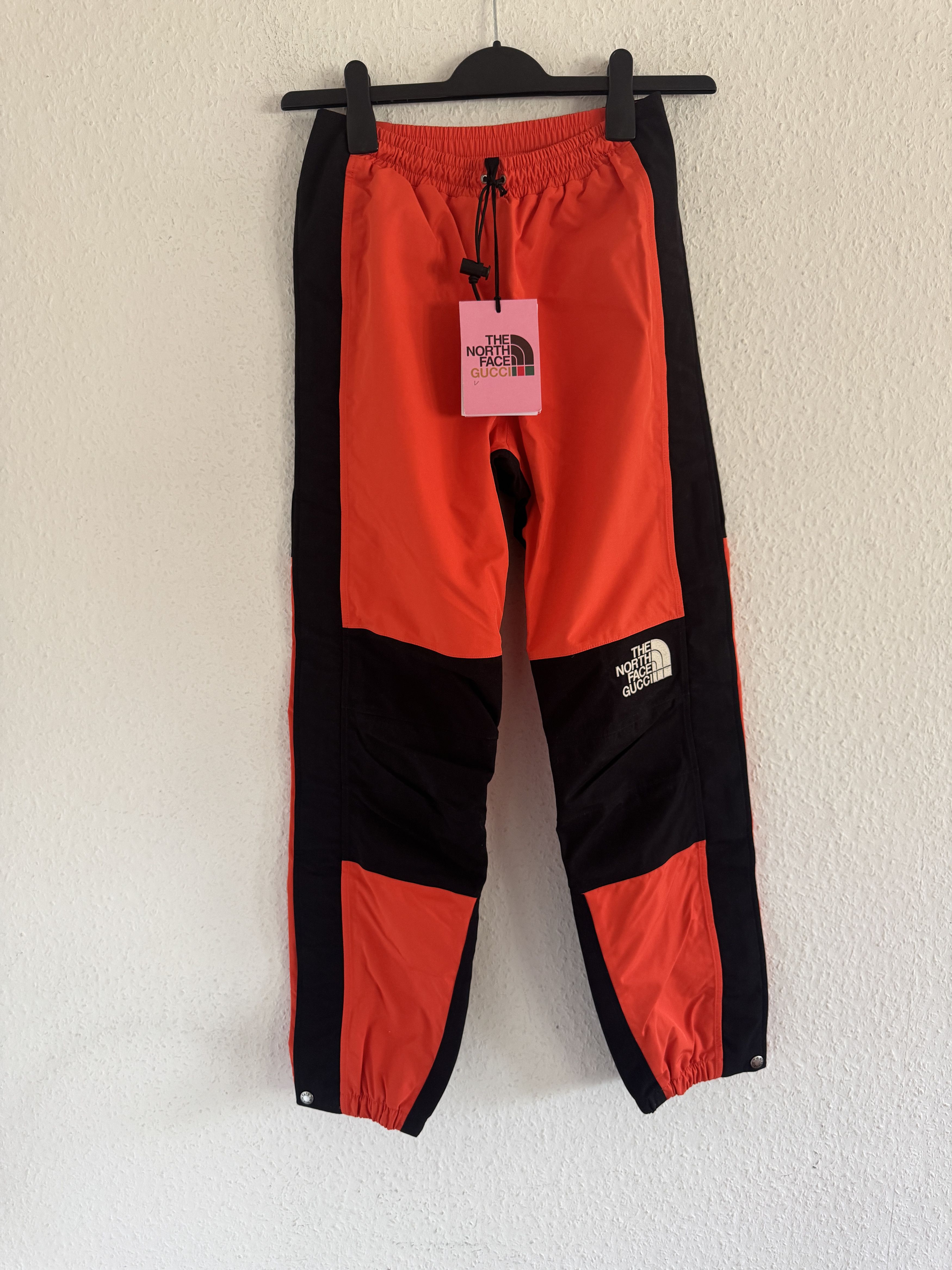 Gucci × The North Face Nylon Track Pants Orange/Black Size US 27 - 1 Thumbnail