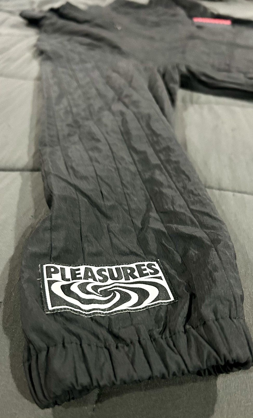 Pleasures PLEASURES Rescue Pleated Track Jacket – Black size large Size US L / EU 52-54 / 3 - 12 Thumbnail