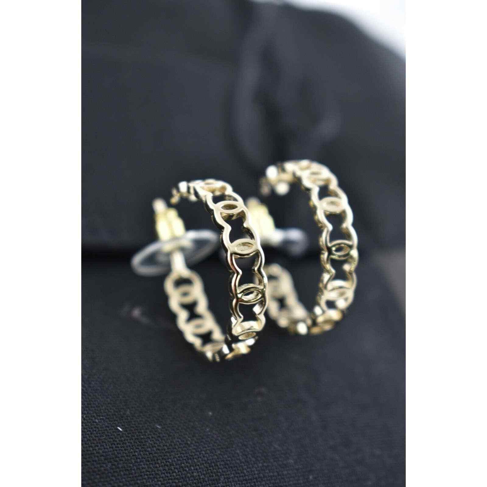 Chanel Chanel Gold Metal Interlocking Drop Statement Hoop Earrings Size ONE SIZE - 3 Thumbnail