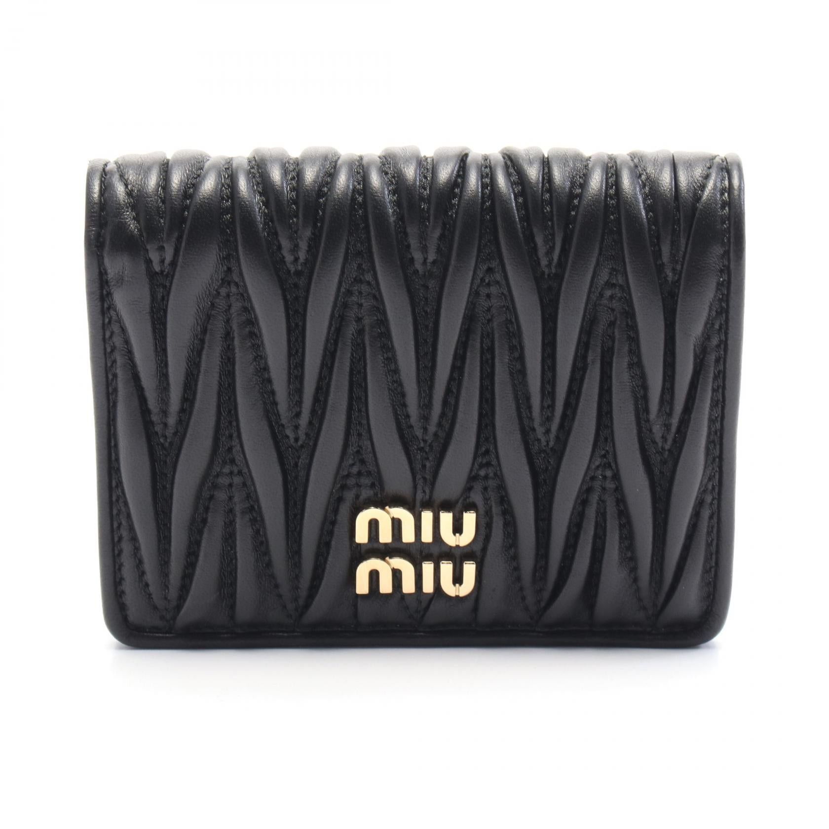 Miu Miu Miu Miu Matelasse Bi-Fold Wallet Leather Black Size ONE SIZE - 1 Thumbnail