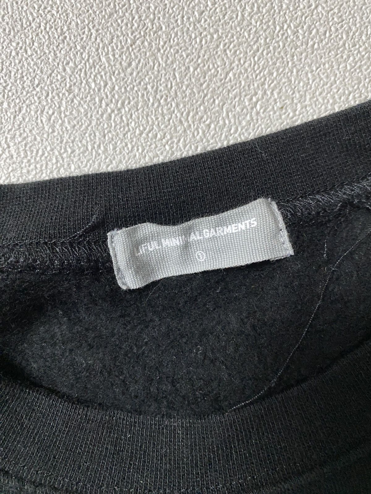 LIFUL MINIMAL GARMENTS Rifle Crewneck MINI OVAL LOGO SWEATSHIT-BLACK Size US L / EU 52-54 / 3 - 6 Thumbnail
