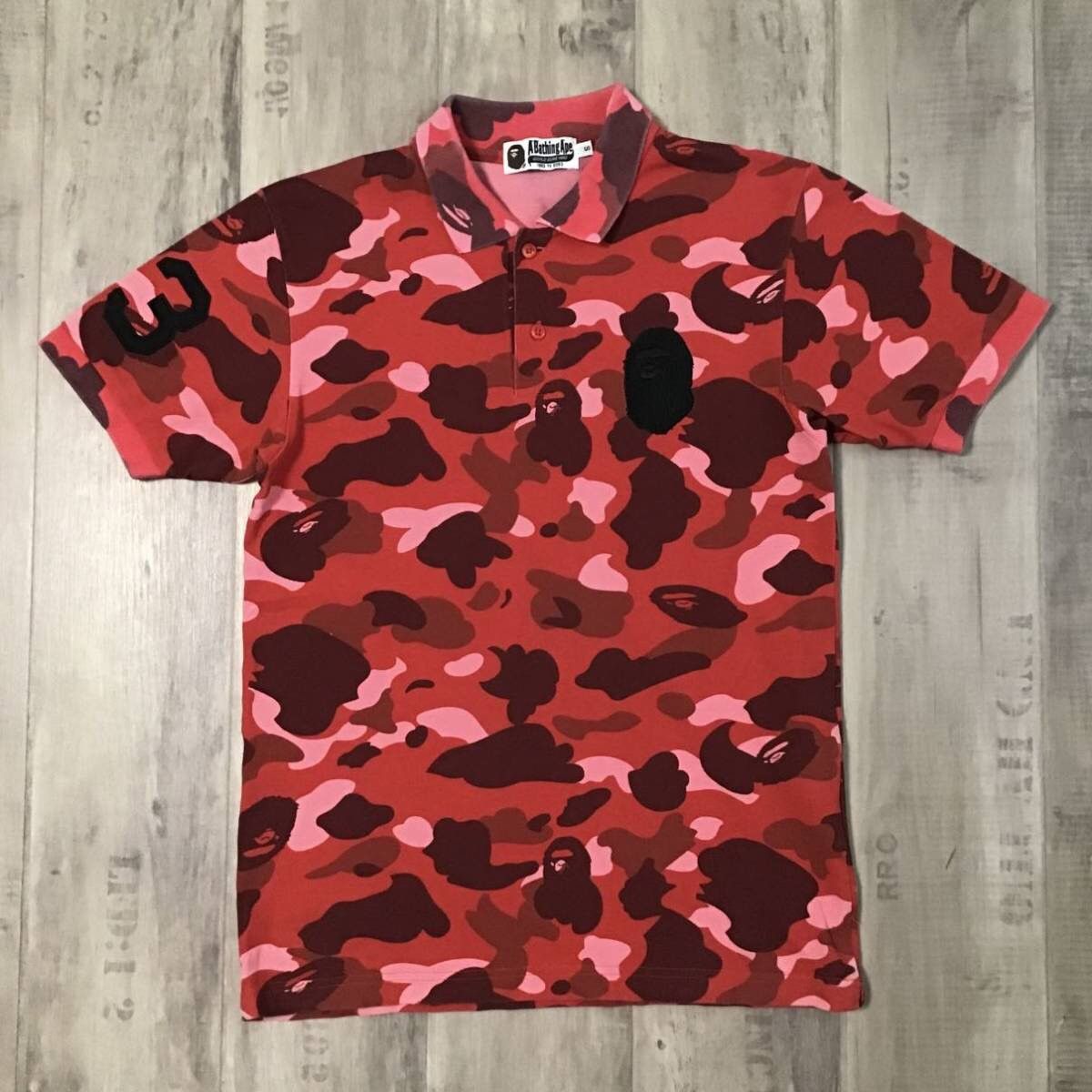 Bape BAPE pharrell camo APE HEAD LOGO polo shirt a bathing ape | Grailed