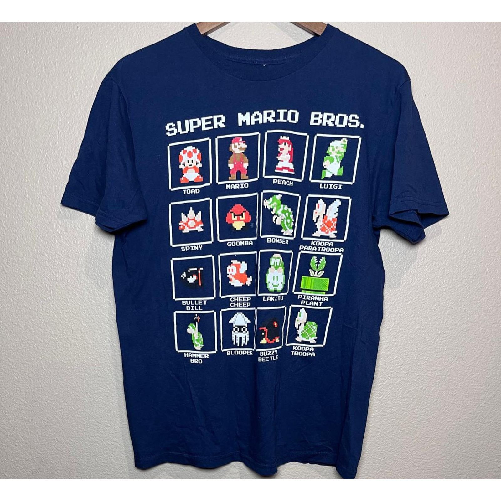 Other 🎮 Super Mario Bros. Pixel Character Grid Tee – Size M Size US M / EU 48-50 / 2 - 1 Thumbnail
