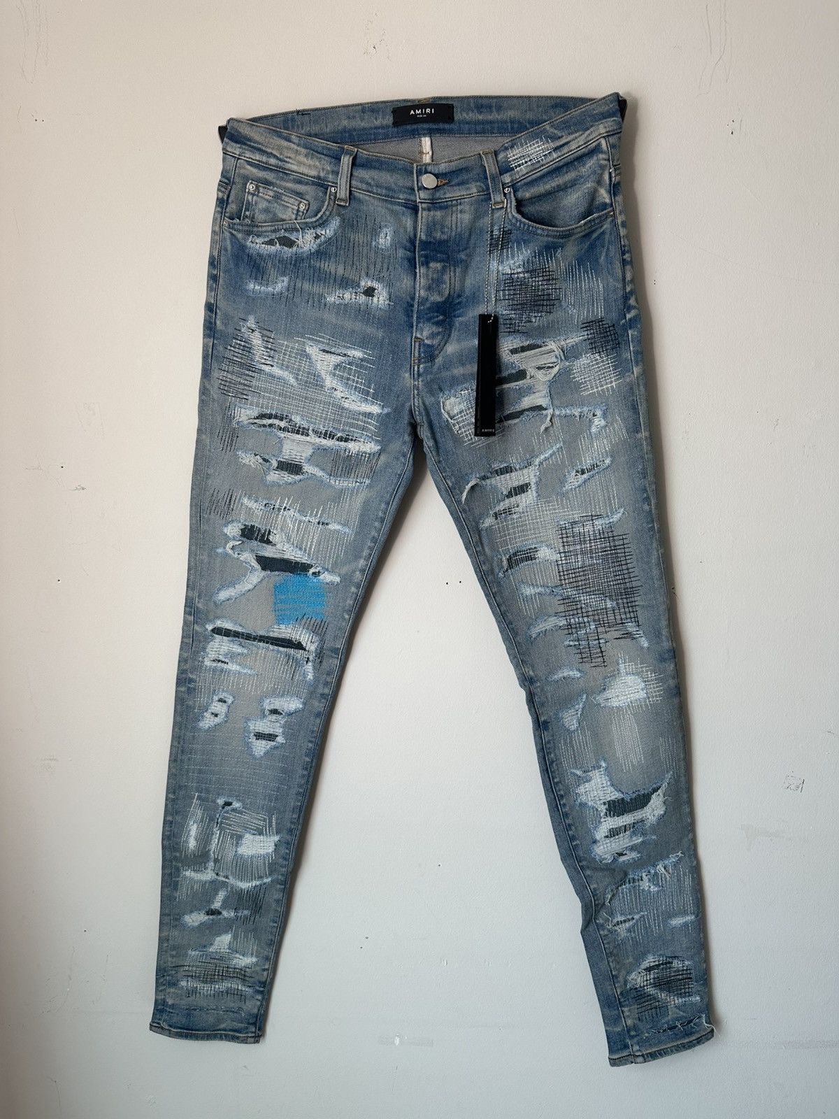 Amiri All Over Stitches Repair Clay Indigo Jeans