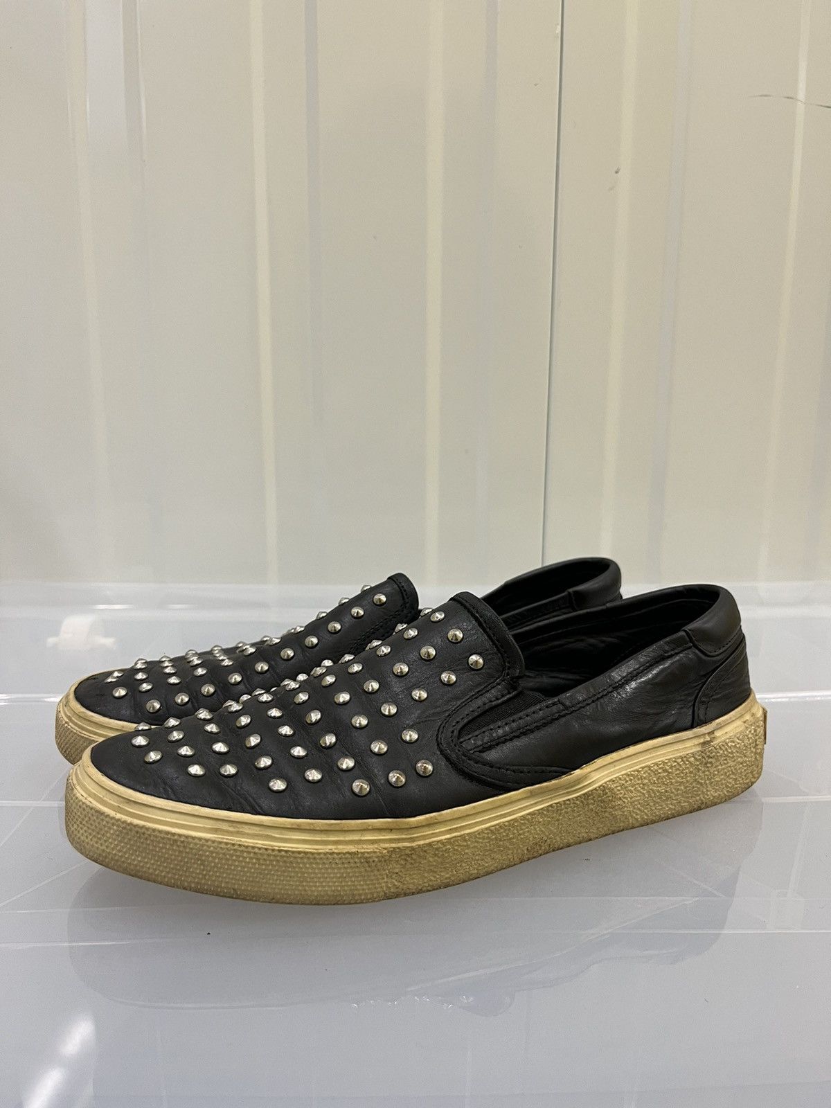 image of Saint Laurent Paris Studded Leather Low Slip Ons Shoes in Black, Men's (Size 6)