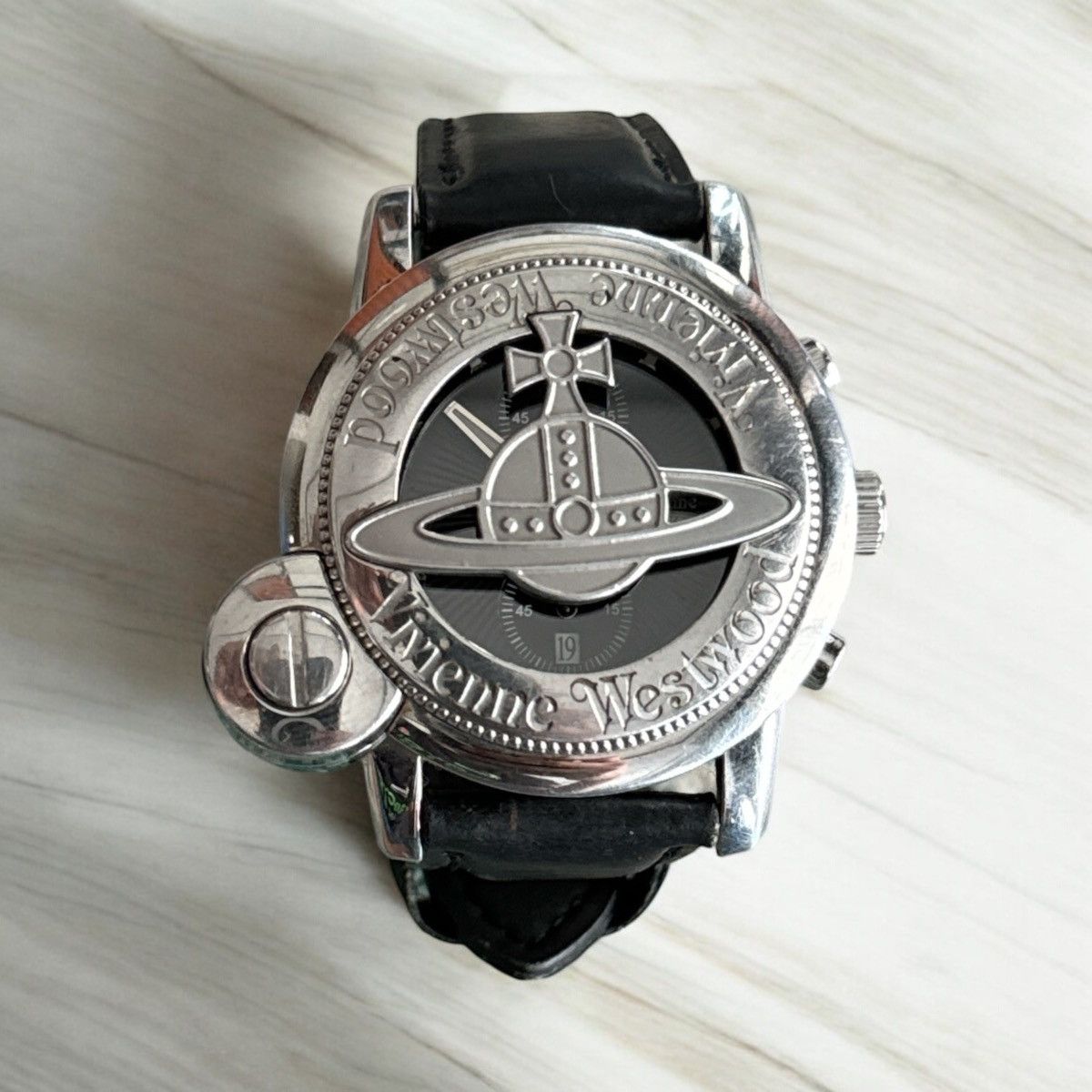 Vivienne Westwood VIVIENNE WESTWOOD METAL ORB SLIDING CAGE WATCH | Grailed