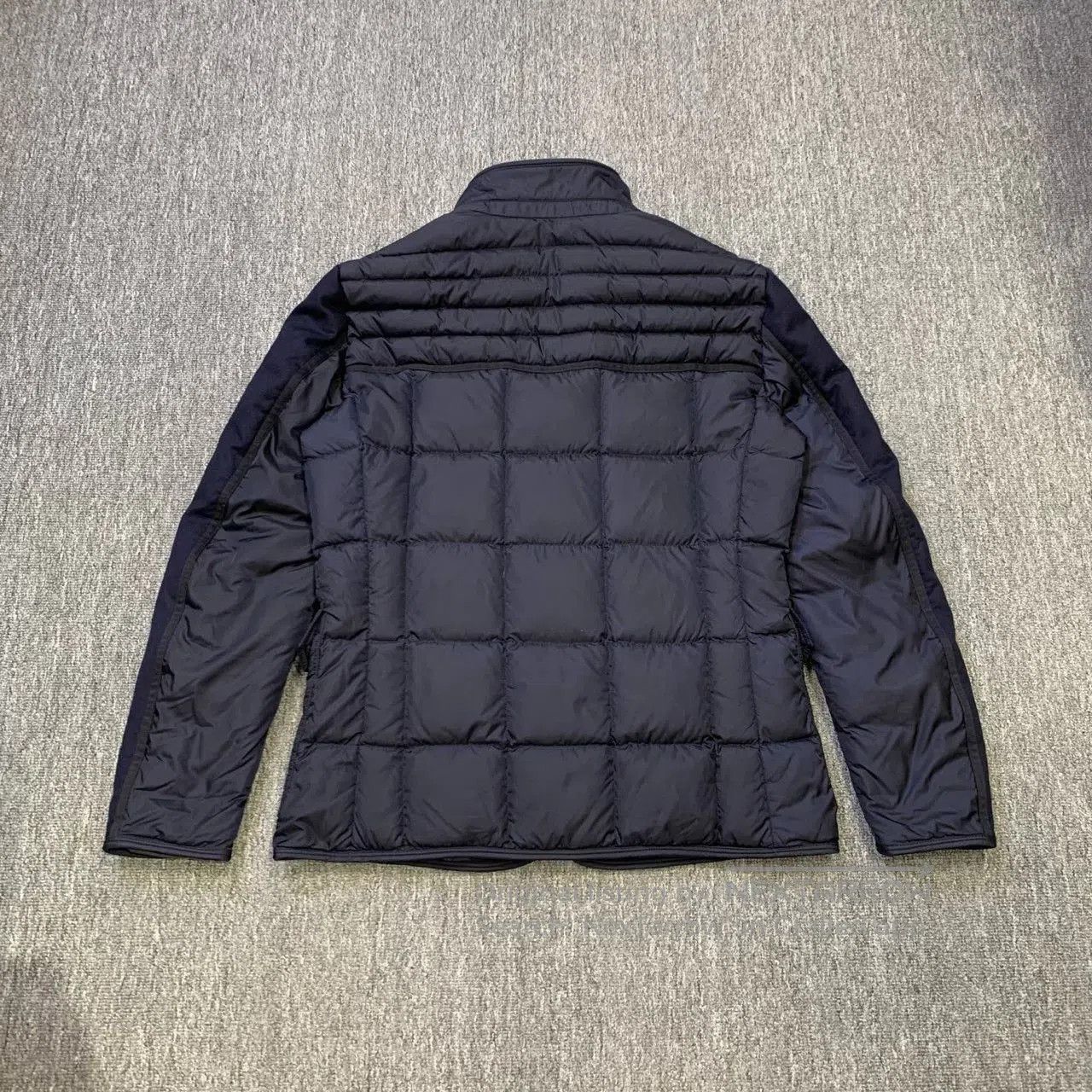 moncler deep blue down jacket with detachable design.