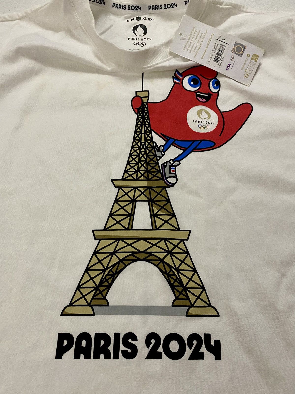 Other Paris Olympics 2024 Eiffel Tower Phryge Mascot Official Tee Size US L / EU 52-54 / 3 - 9 Thumbnail